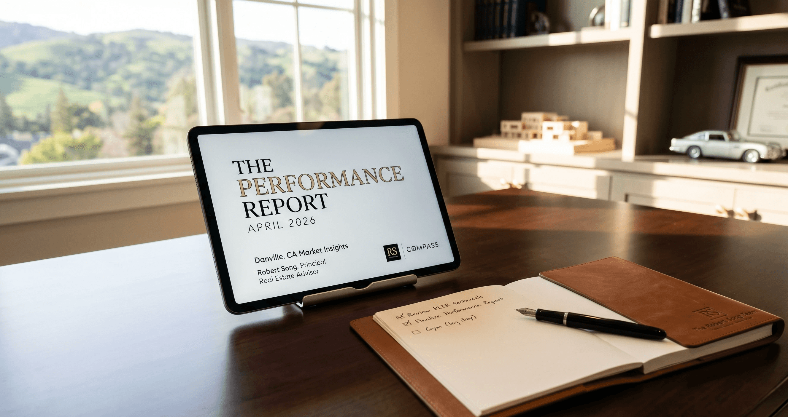 Robert Song April 2026 Danville Performance Report cover on a tablet in a professional home office setting