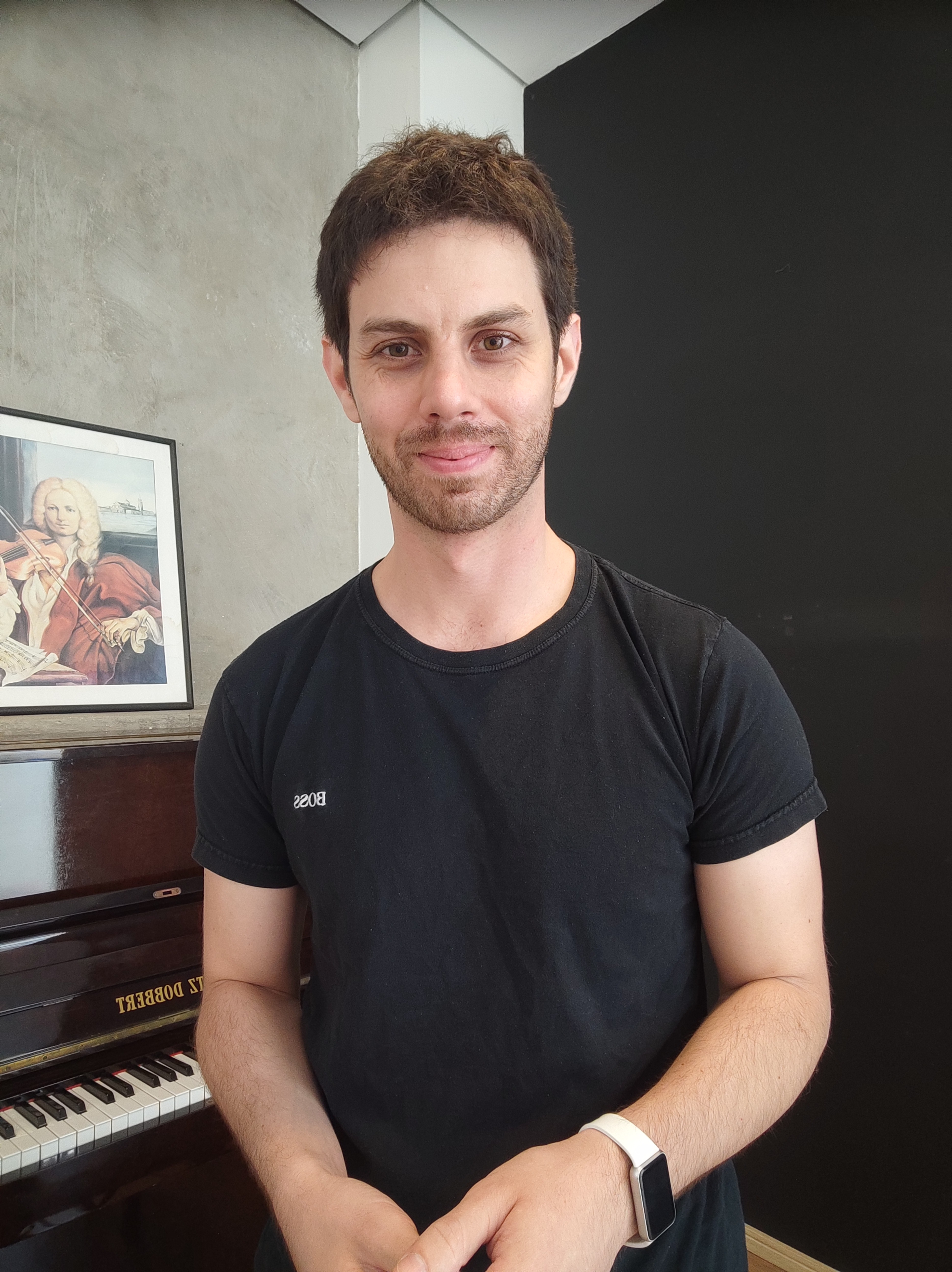 baby playing multicolored xylophone toy
