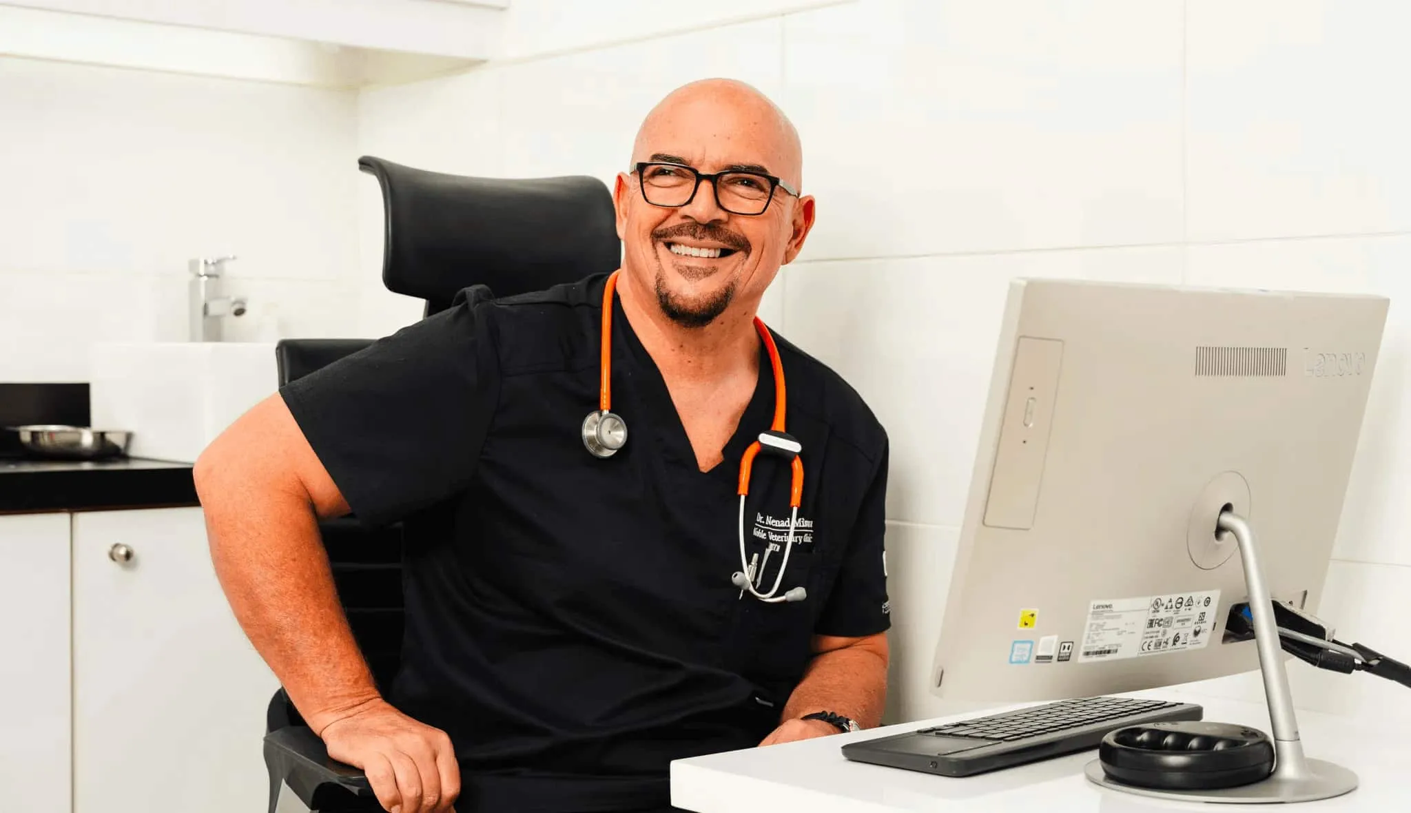 A veterinary specialist gets ready for a virtual vet visit with a pet patient.