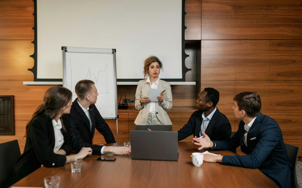 An upper management meeting in an office.