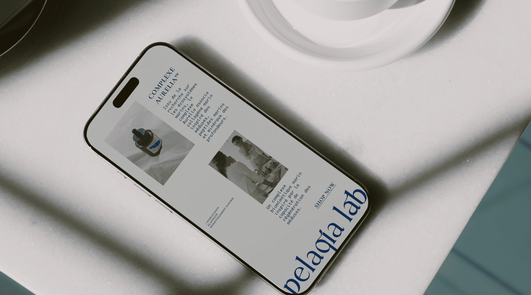 Man in a white shirt reclines in a chair on a red carpet, talking on the phone. Scattered papers surround him, conveying stress or disarray.