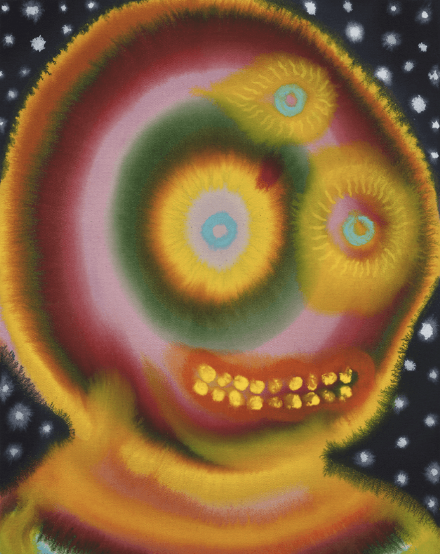 Young woman in colorful robe reads a book.