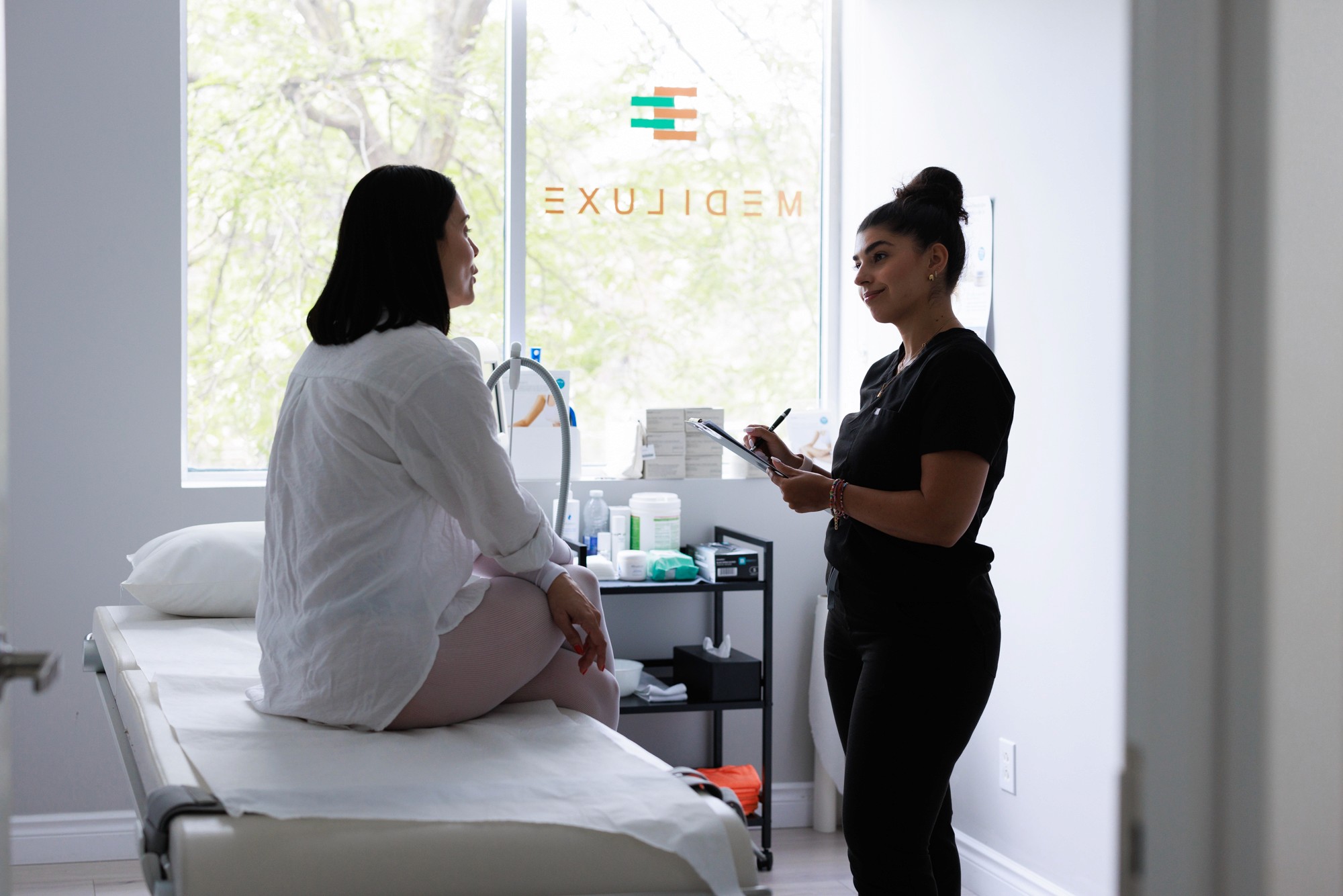 Patient in consultation with beautician