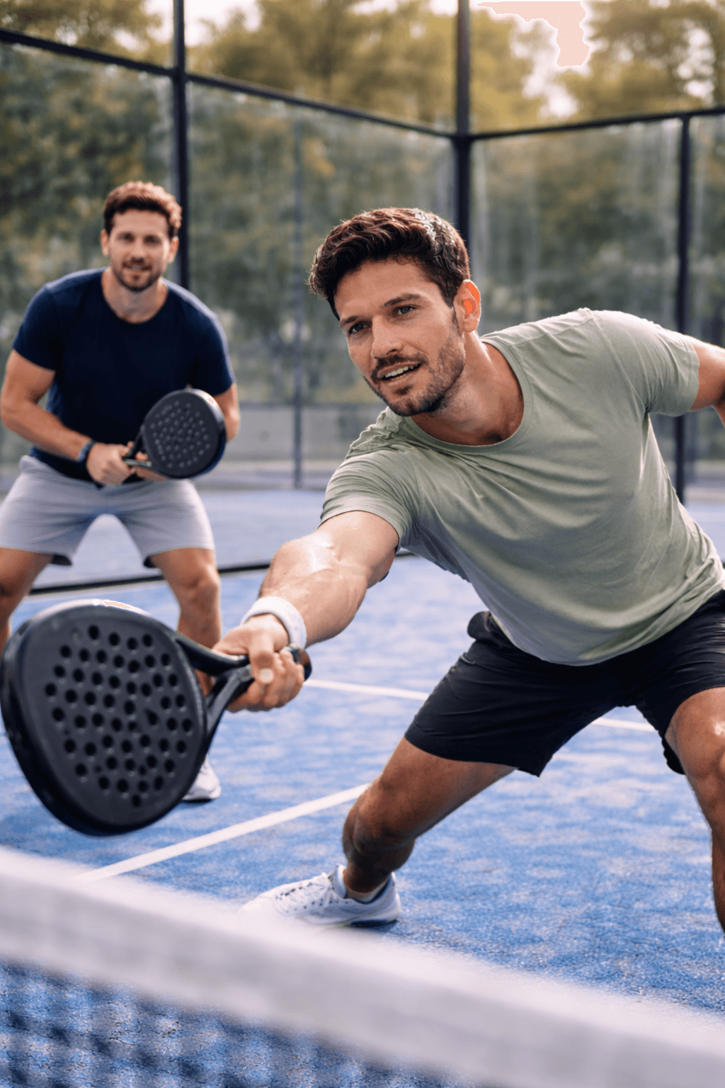 Two men playing paddel