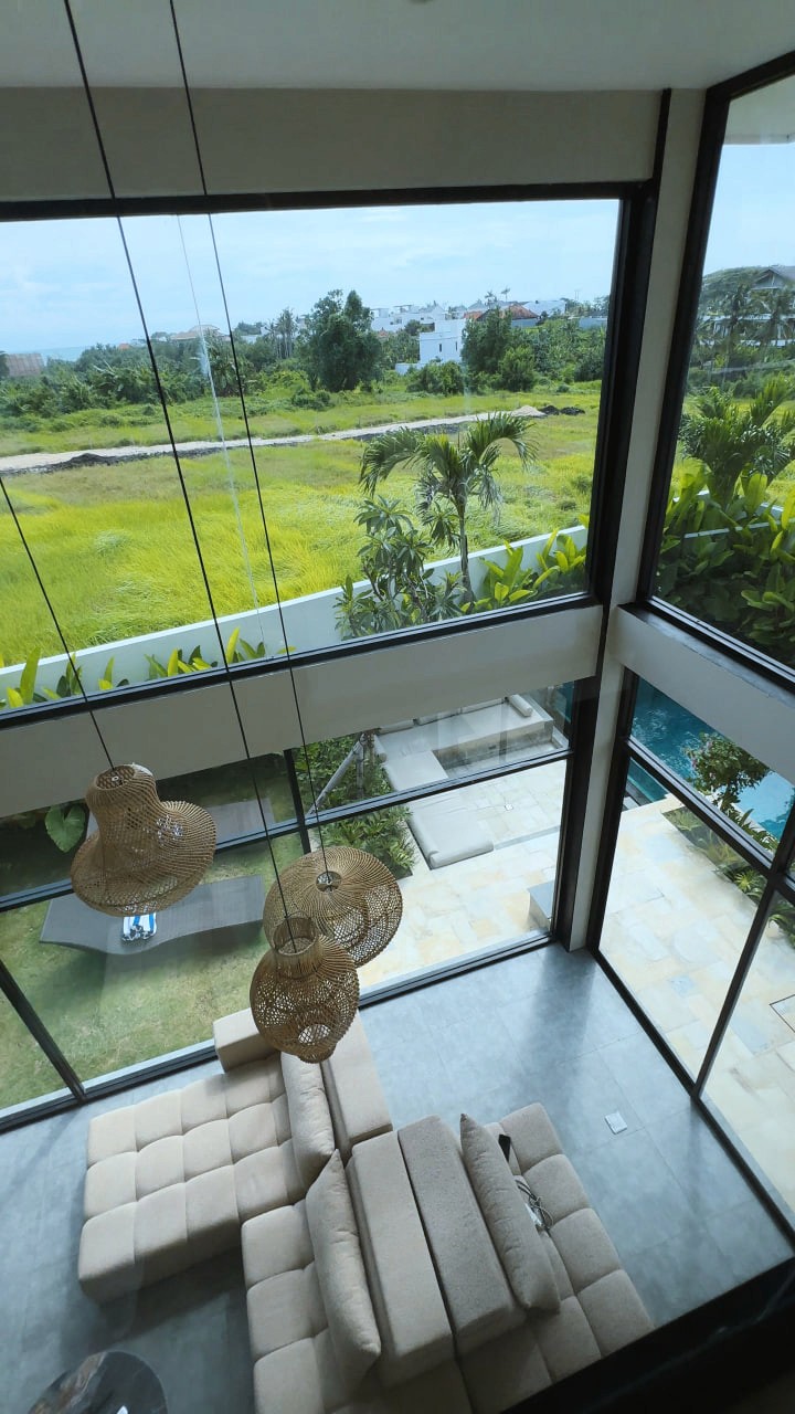 A three-level 4-bedroom villa with panoramic ocean views in Pererenan