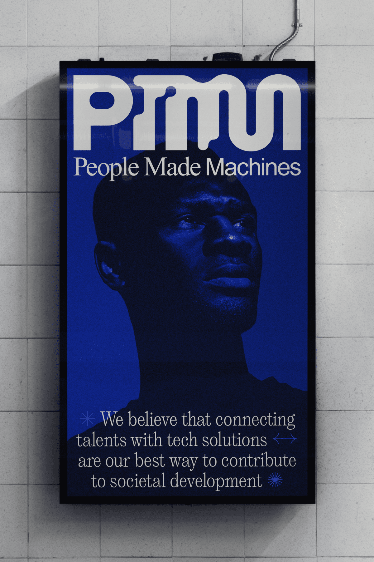 Image of out-of-house poster with People Made Machines logo and brand imagery.