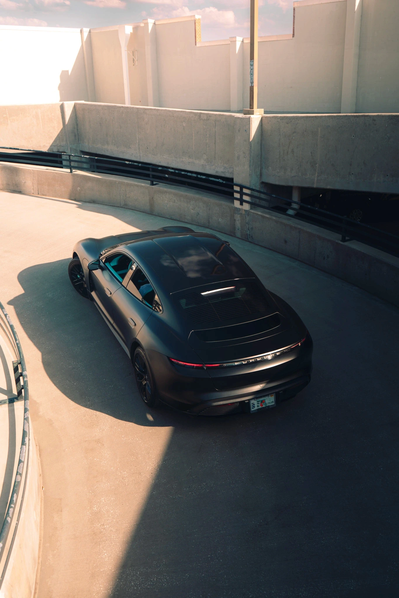 Collection of luxury sports cars displayed in modern rental showroom