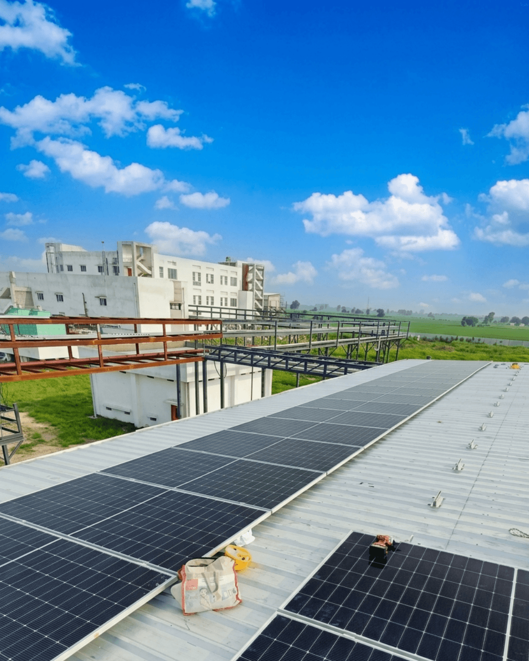 Arush Solar Tech commercial rooftop solar installation aerial view Bengaluru Karnataka night
