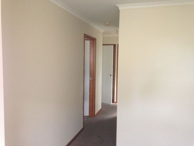 Residential hallway in Melbourne home with clean, fresh paint by Alicon Painting.