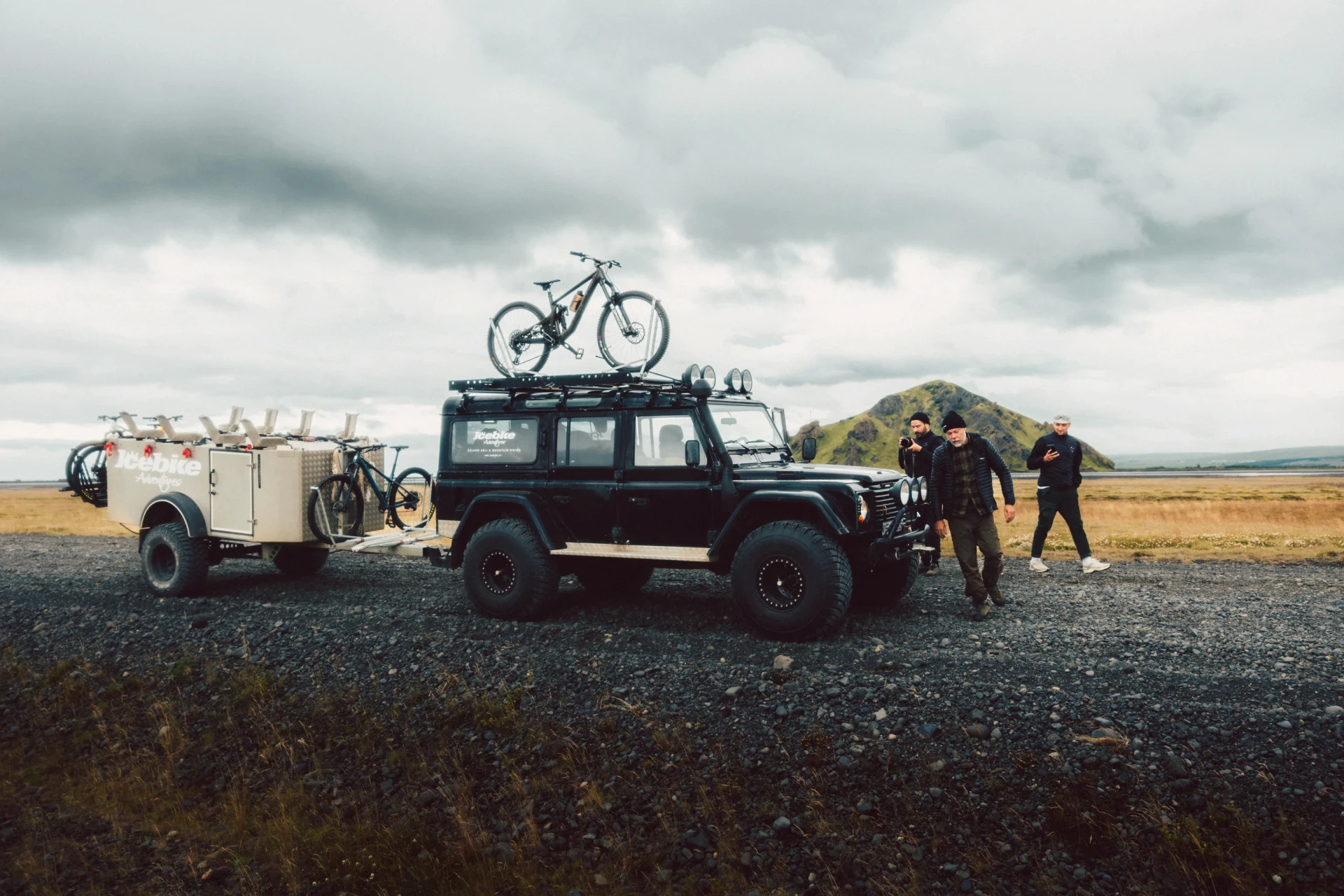 Landrover defender with a biketrailer in highlands of Iceland