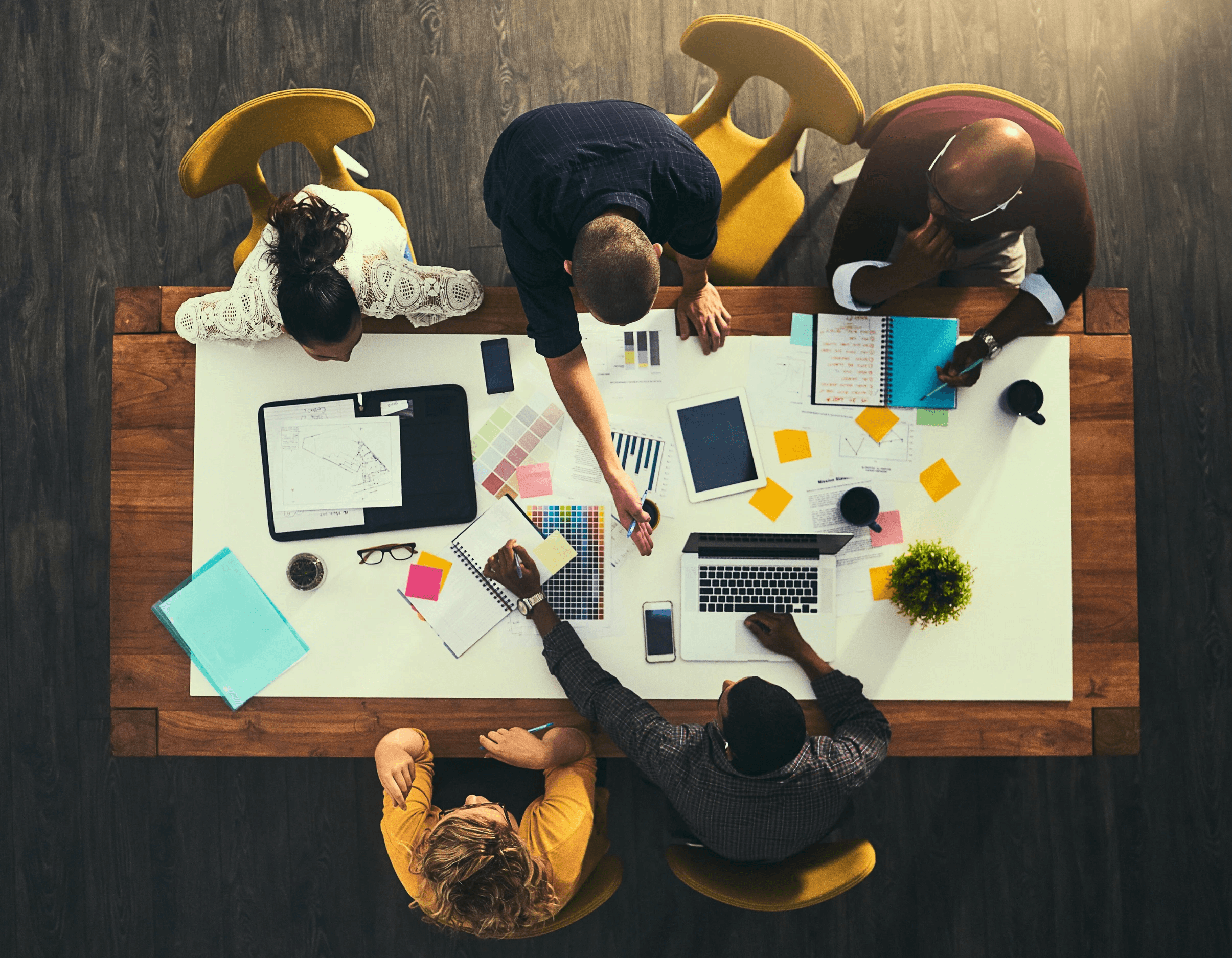 a photo of a ipad in a minimal workspace