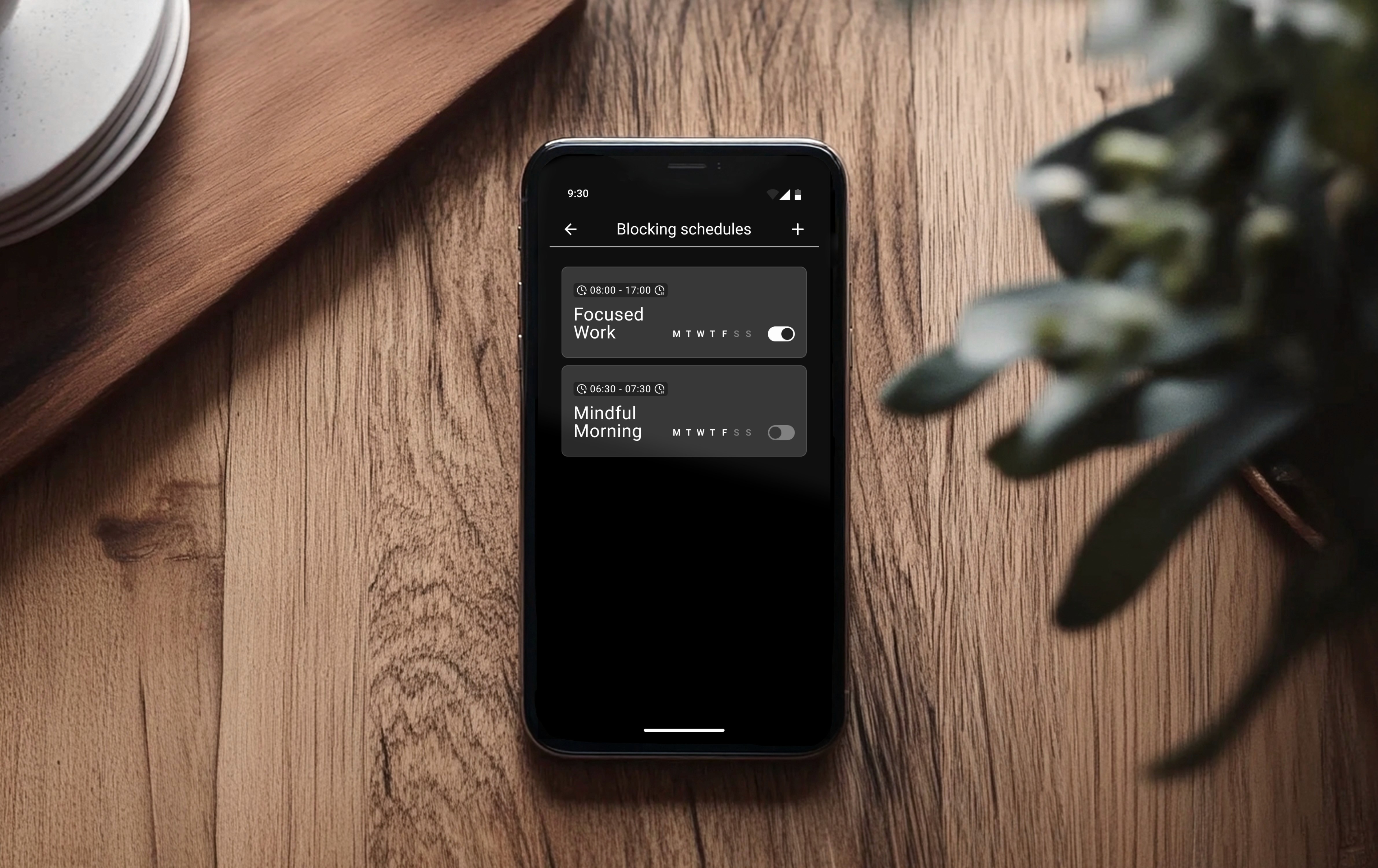 Smartphone showing minimalist phone Blocking Schedules for focused work and mindful mornings to reduce digital distractions.