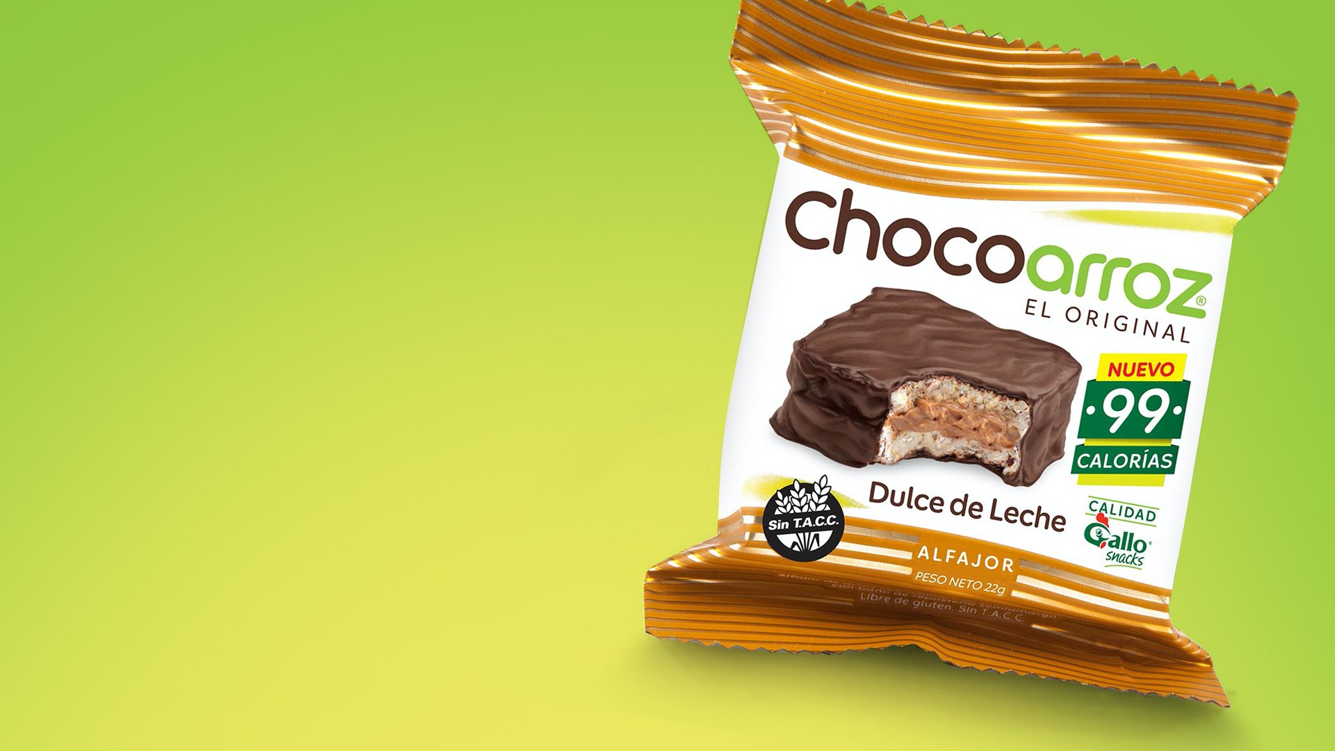 A packet of "Chocoarroz" alfajor with dulce de leche sits on a vibrant green background. The packaging is mostly white with brown accents, highlighting its low-calorie content of 99 calories. The image conveys a fresh and enticing feel.