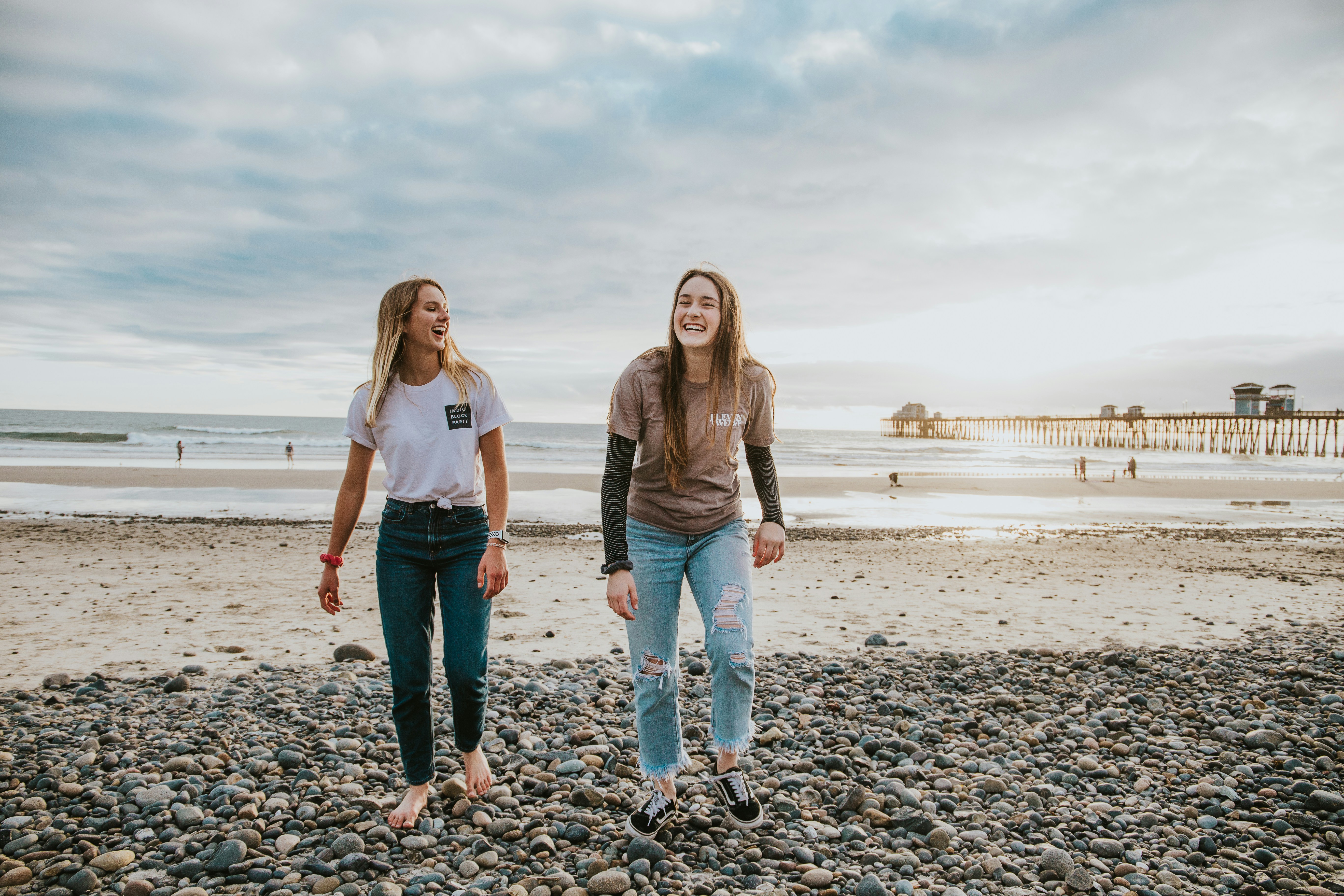 friends on a beach - Fall Game Day Outfits