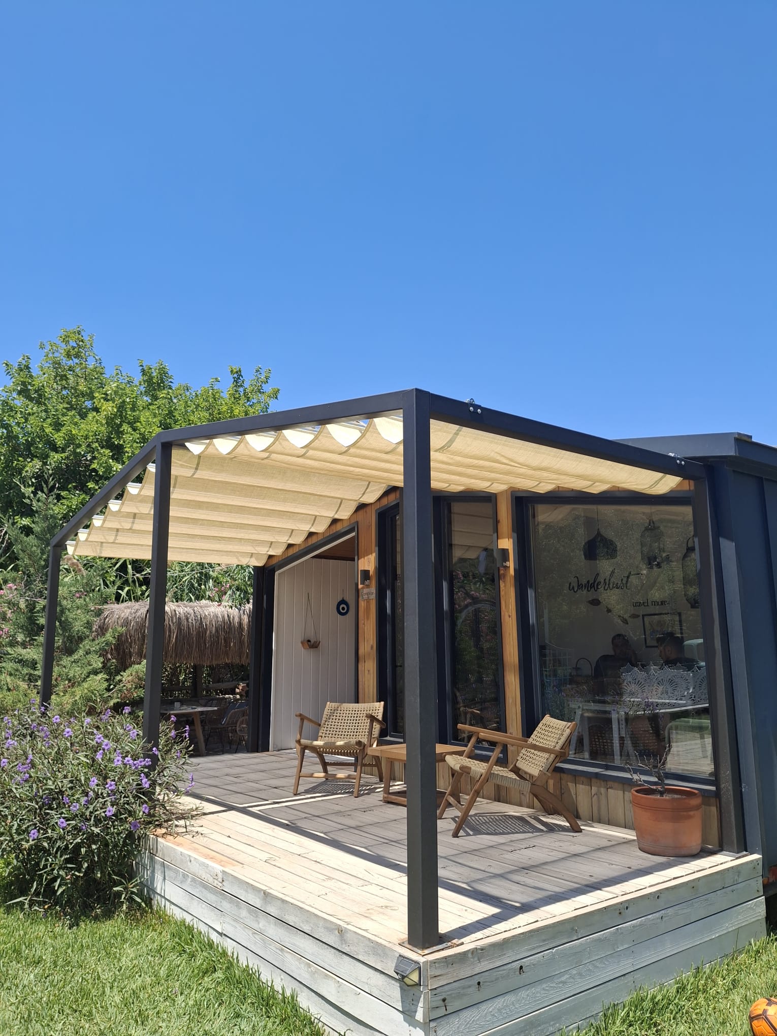 two people looking at a tablet and smiling