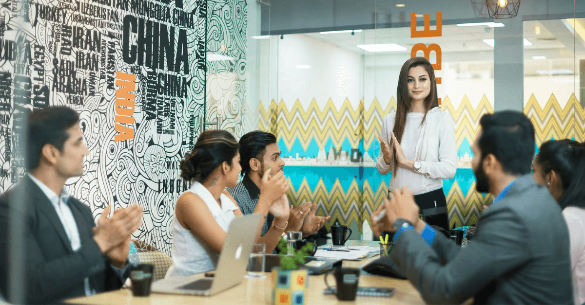 men and women having a meeting