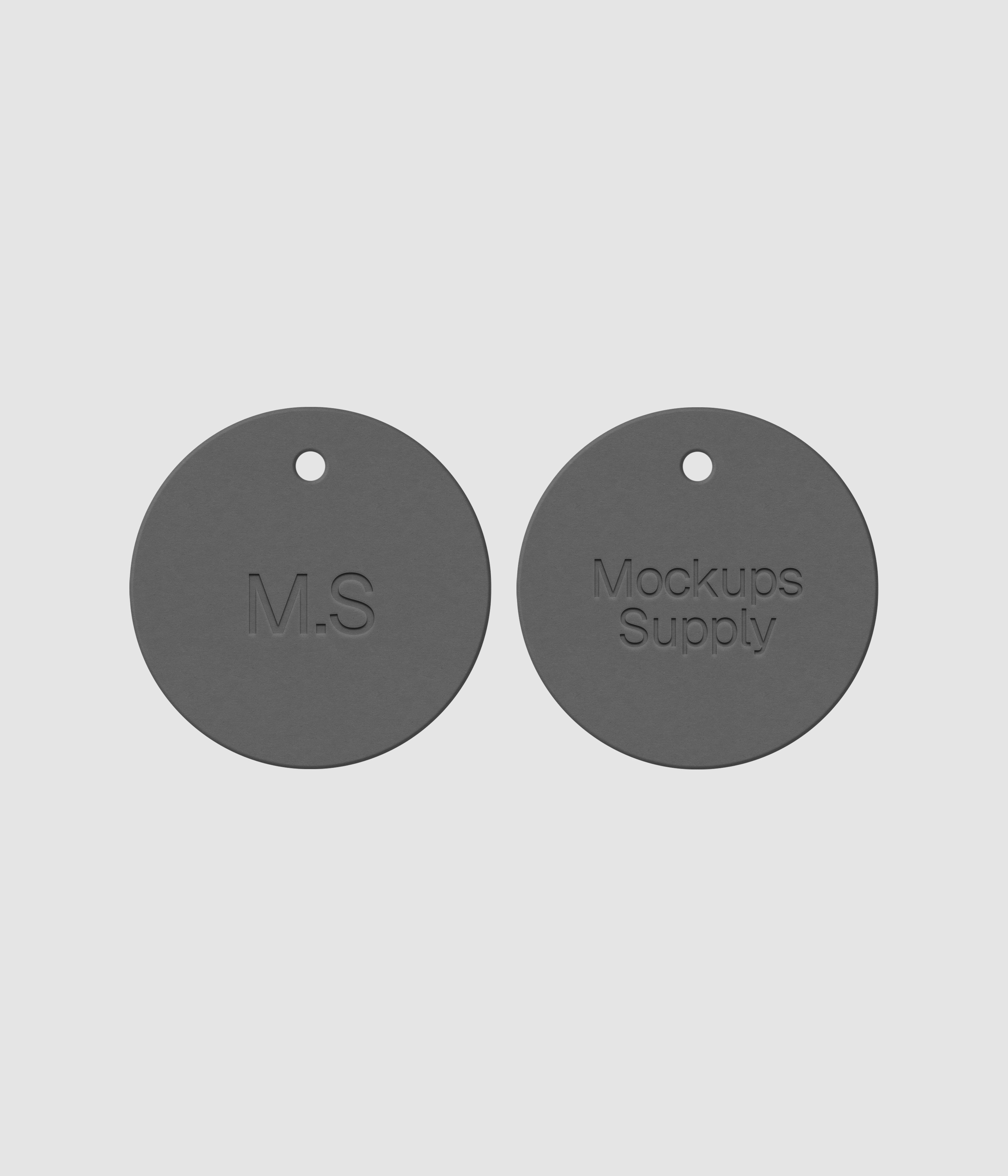 Circular white paper hang tags with embossed logo design on dark backdrop mockup for brand identity presentation