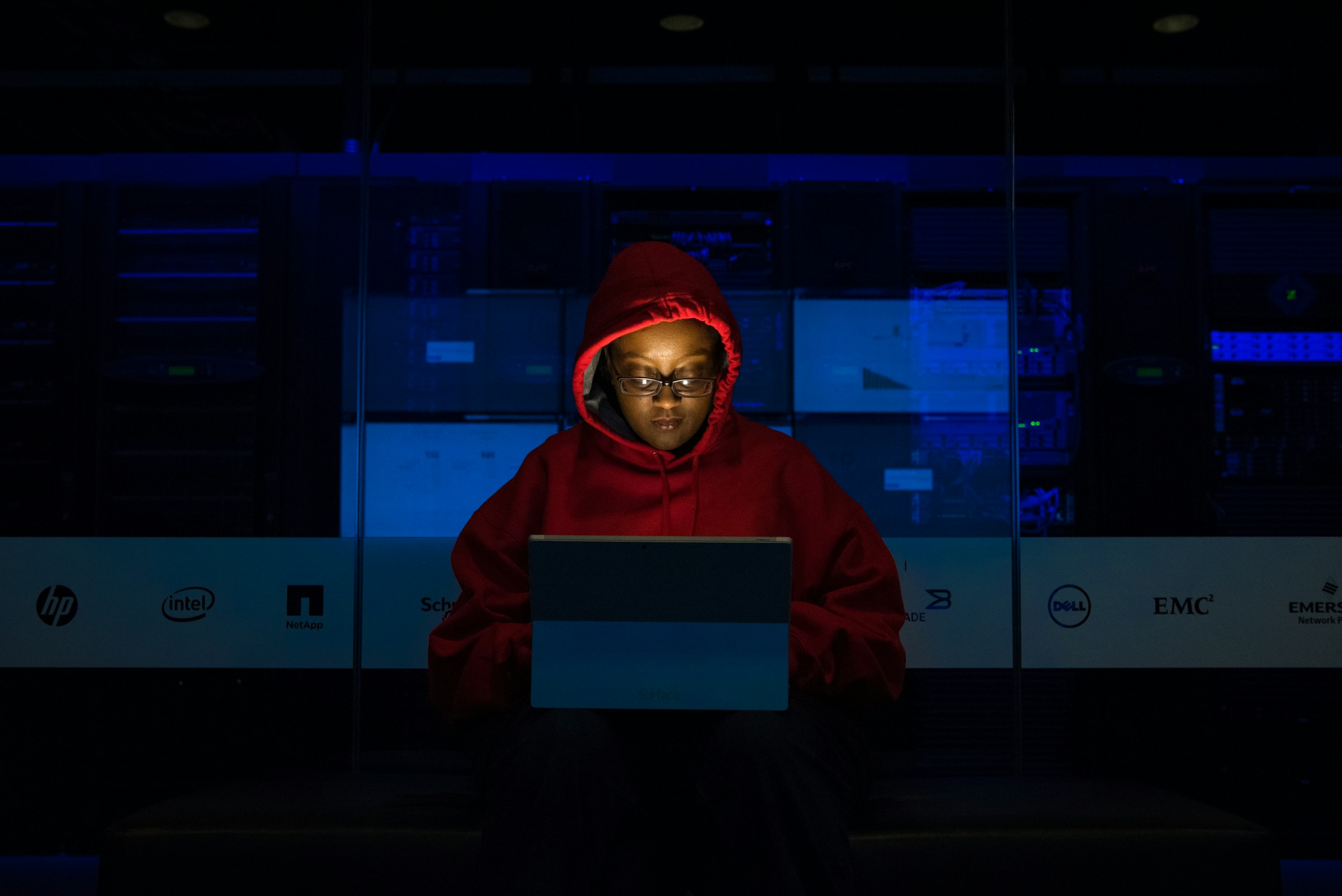 woman working in low light - Quillbot Alternatives