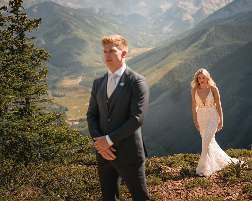 Couple portrait overlooking Aspen mountains at Smith Cabin Aspen wedding scenic viewpoint