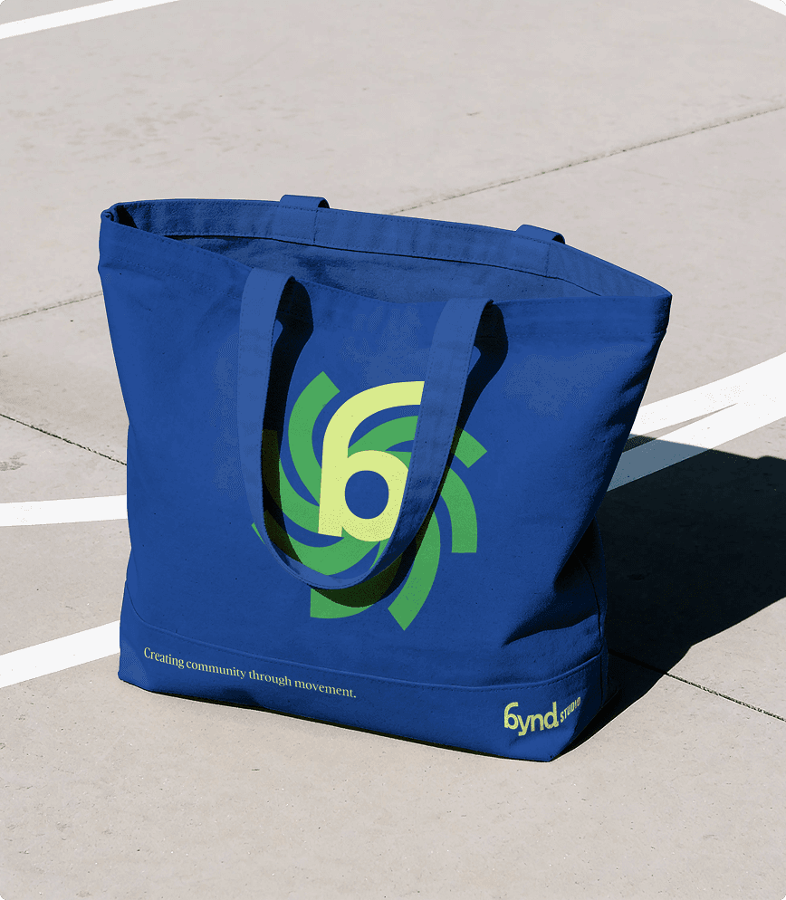 bynd icon on a blue tote bag