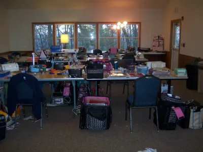 Crop room set up with tables and supplies for a card-making class