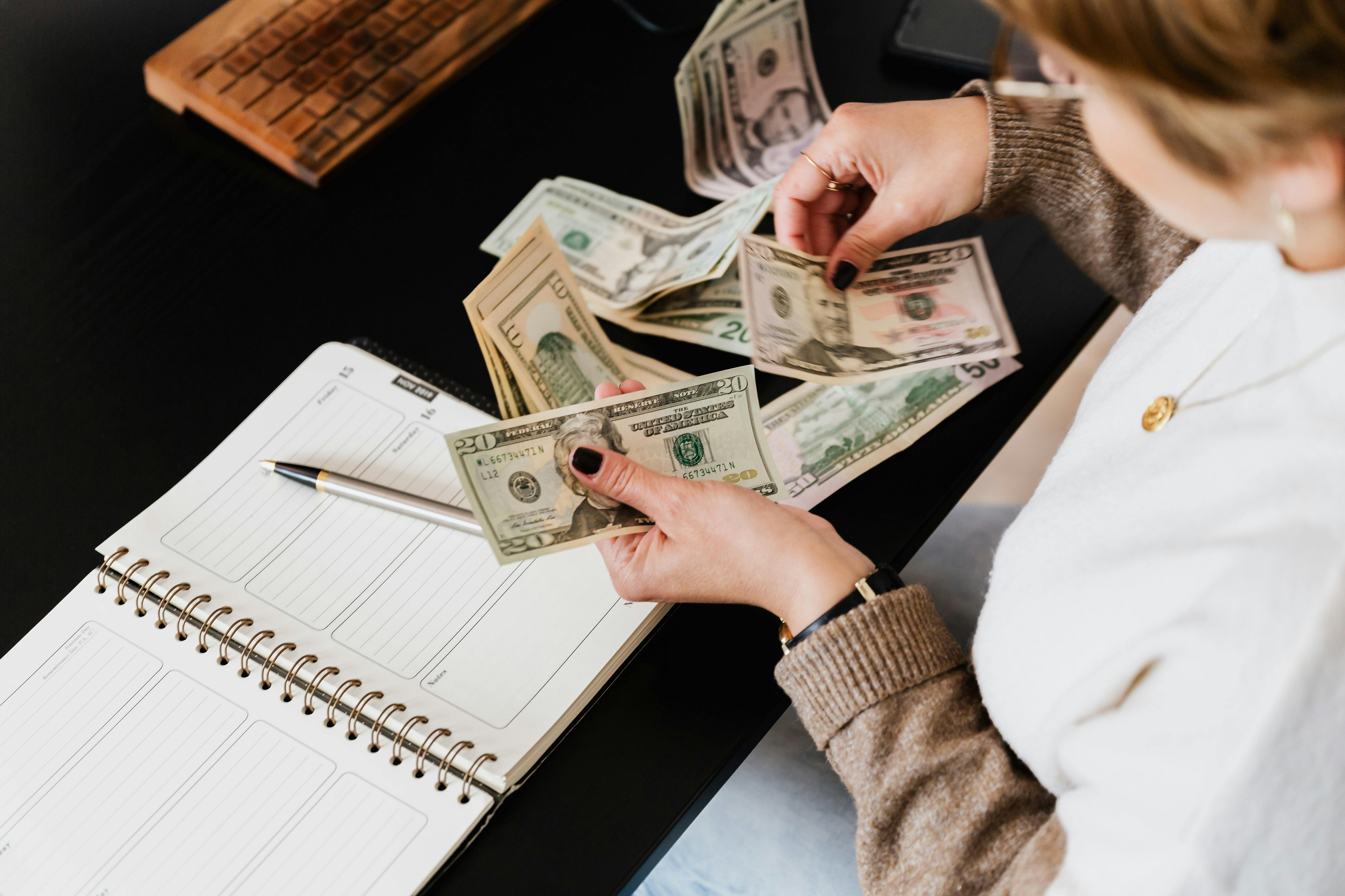 Borrower counting her money