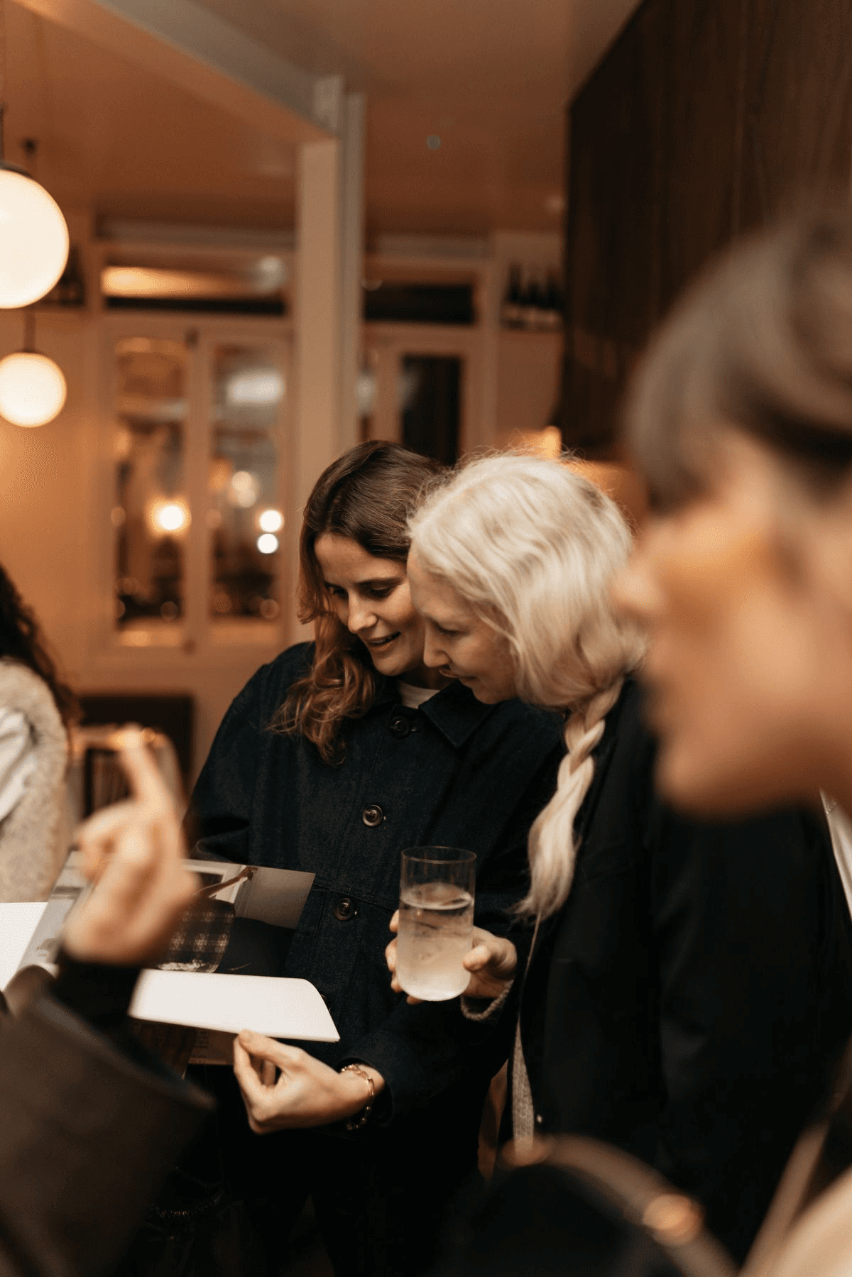 husband and wife working happily on a laptop