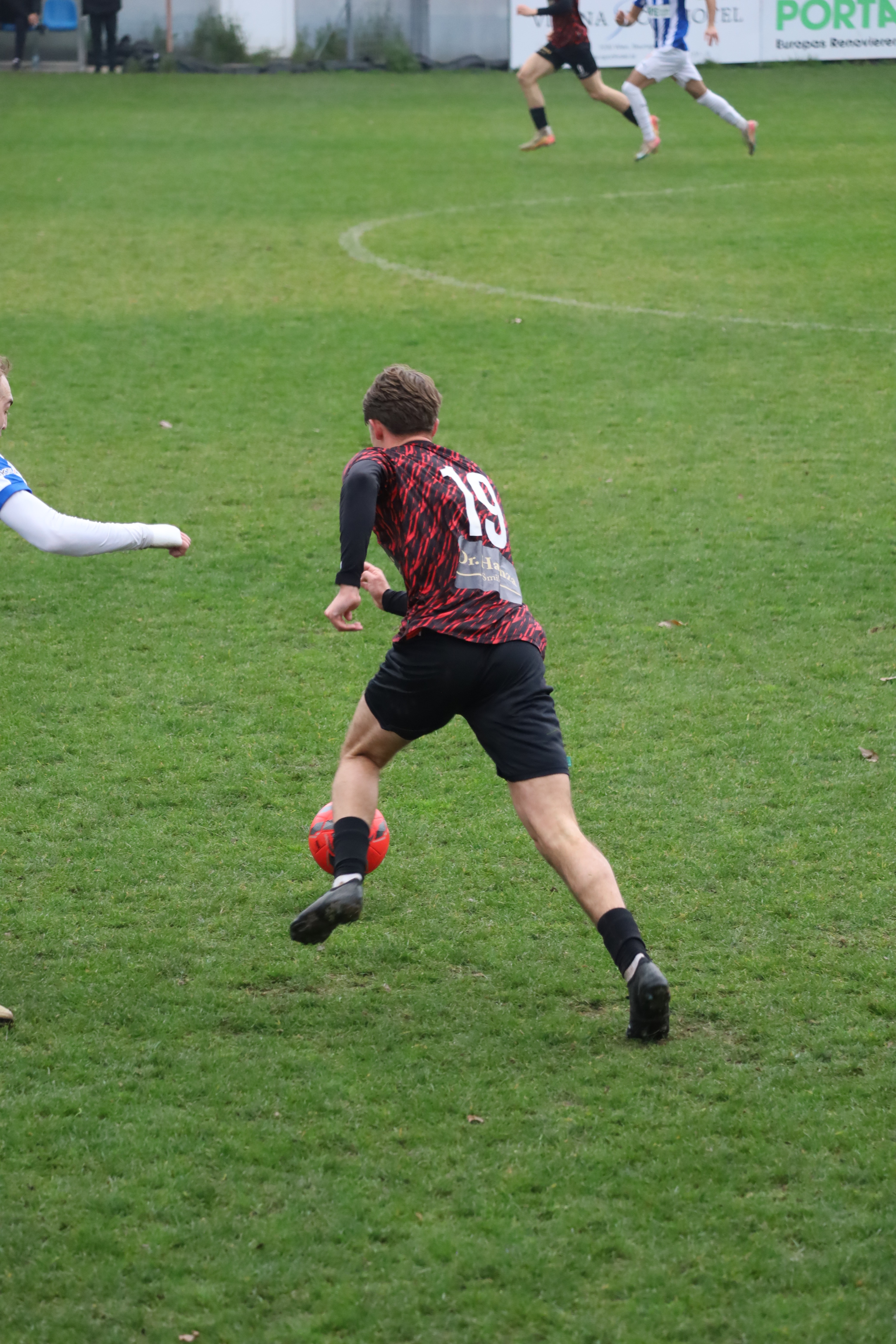 Player sprints forward with the football