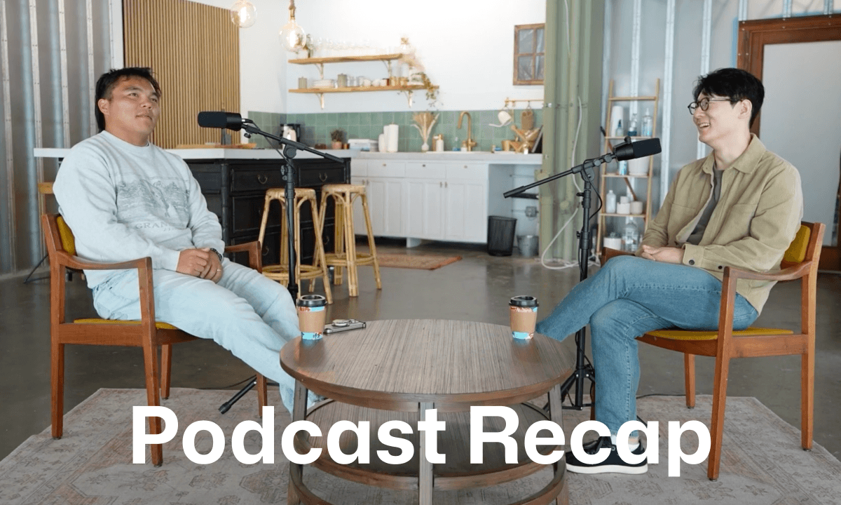 Two people recording a podcast in a casual coffee shop–style studio space.