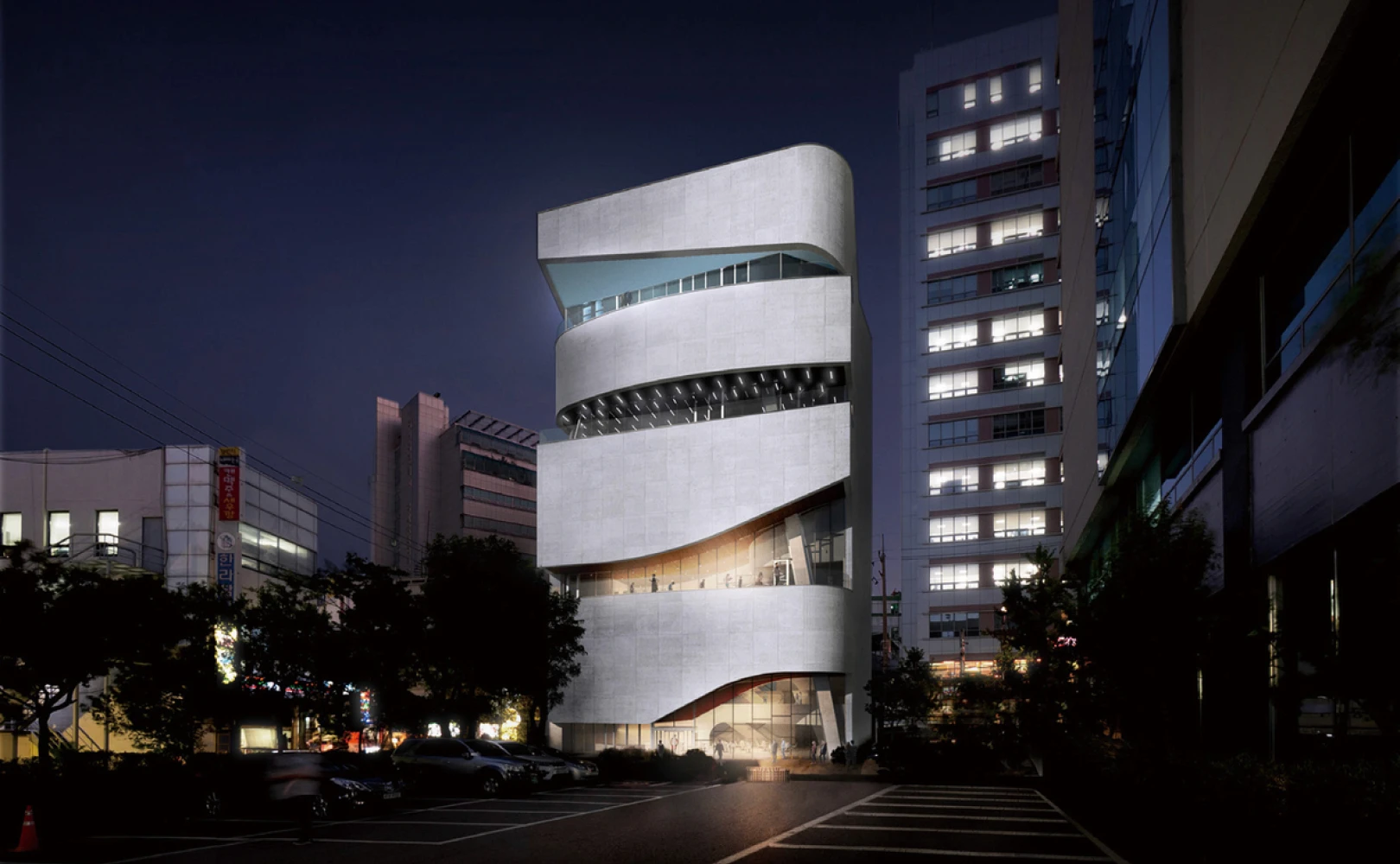 Lone pine tree on snowy hill at sunrise