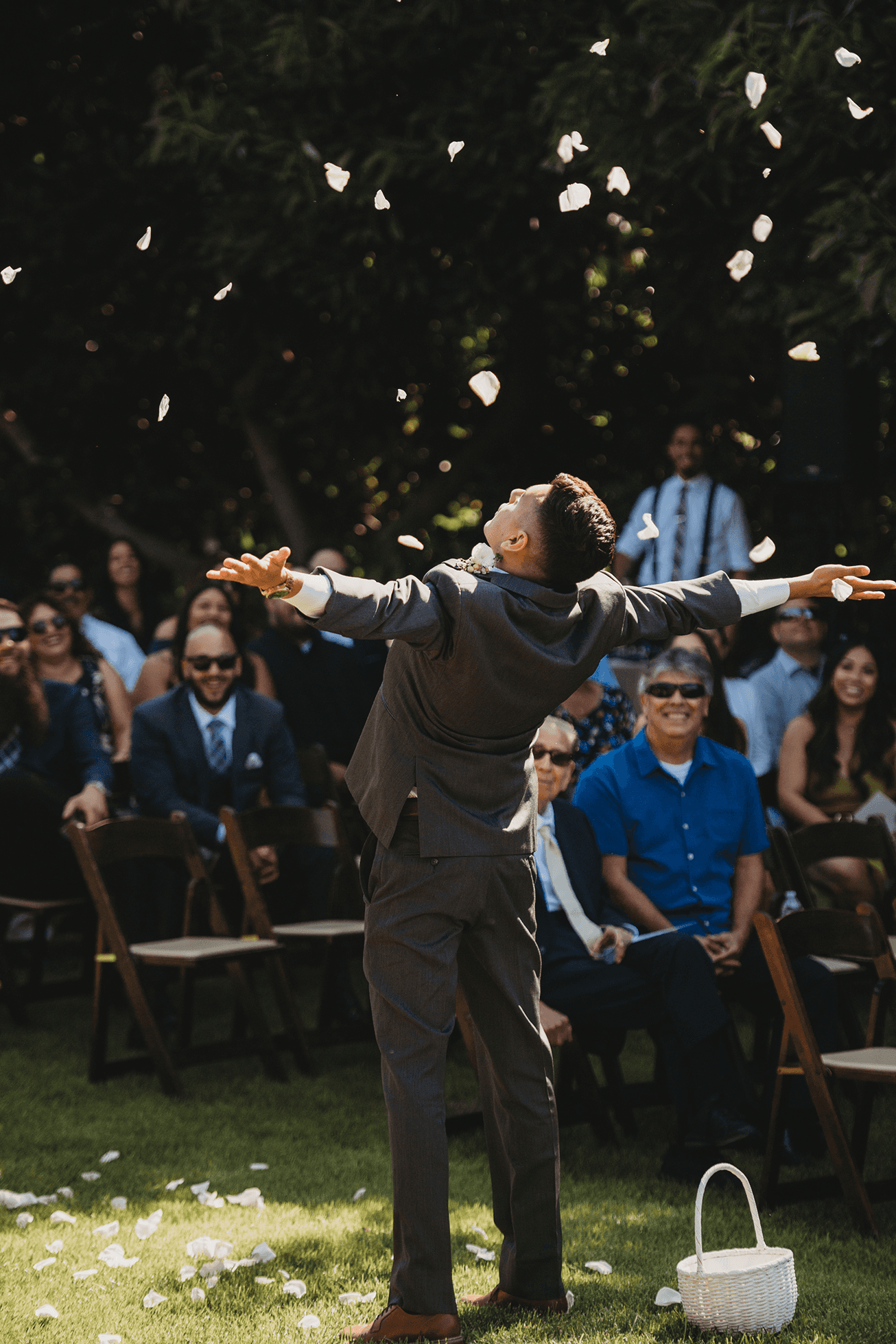 Flat lay wedding details with bouquet, rings, and sparkling bridal heels