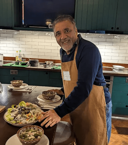 a man standing in a kitchen