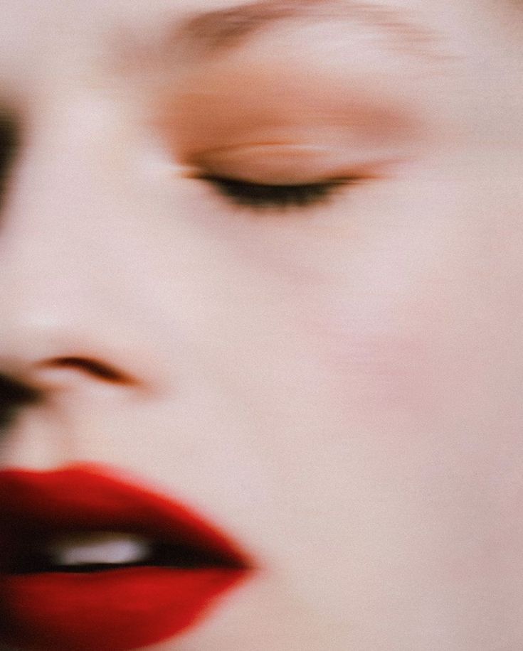 Laptop displaying website on wooden table