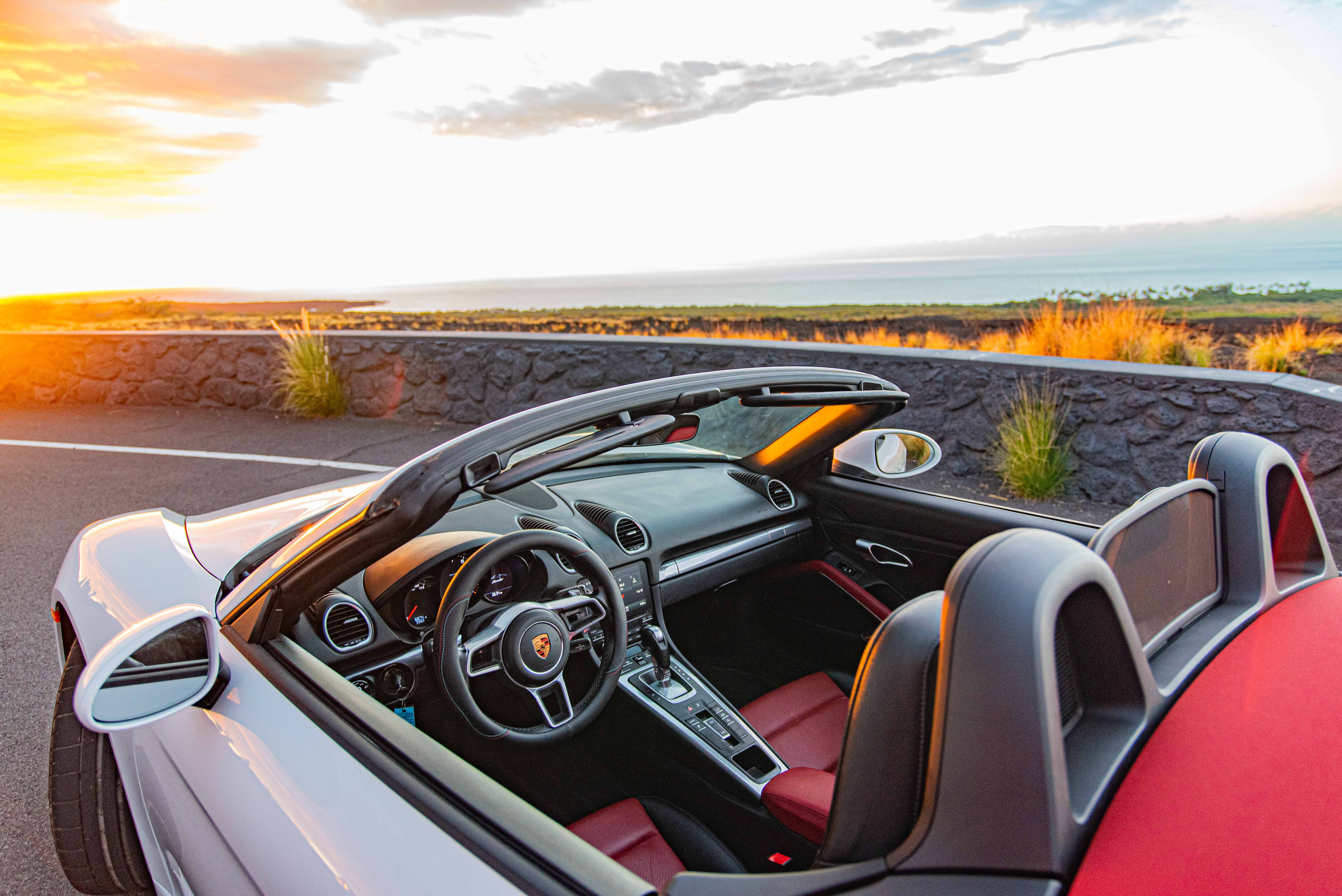 White Porsche Boxster Under Sunset Hawaii Big Island For Rent
