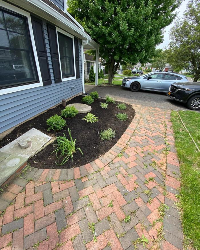 After Topel Industries finished: paver walkway bed