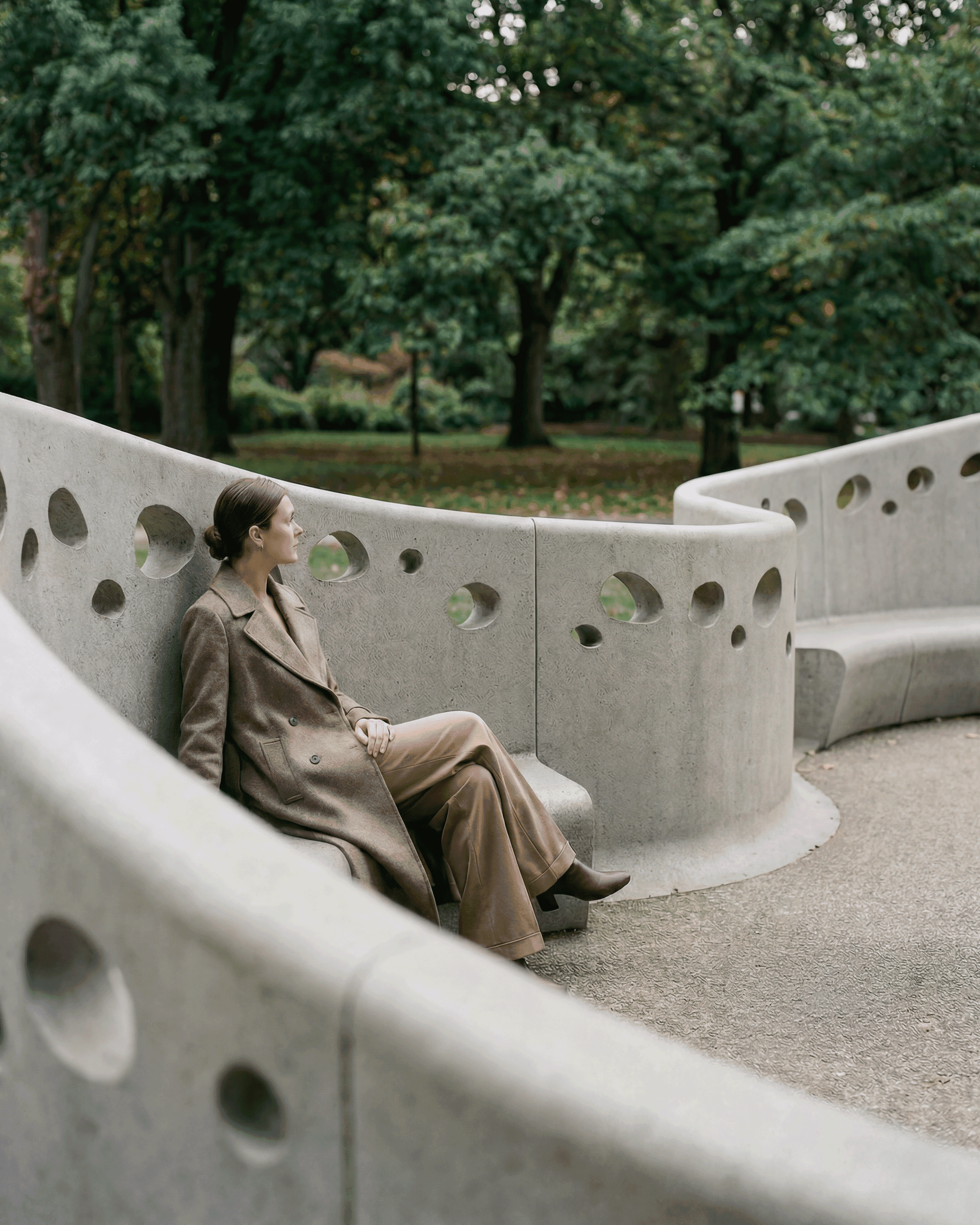 Black-and-white macro of a dandelion seed head on white—delicate botanical detail.