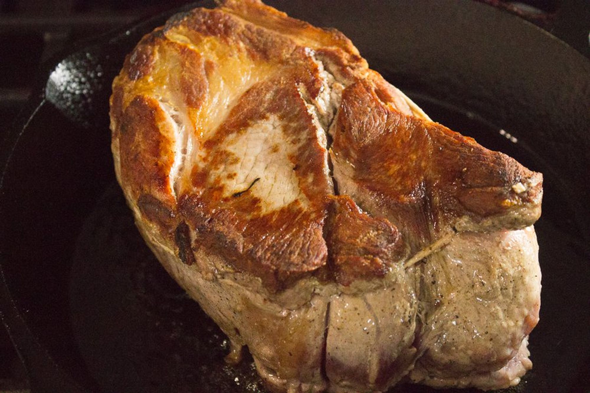 pork roast seared on a skillet