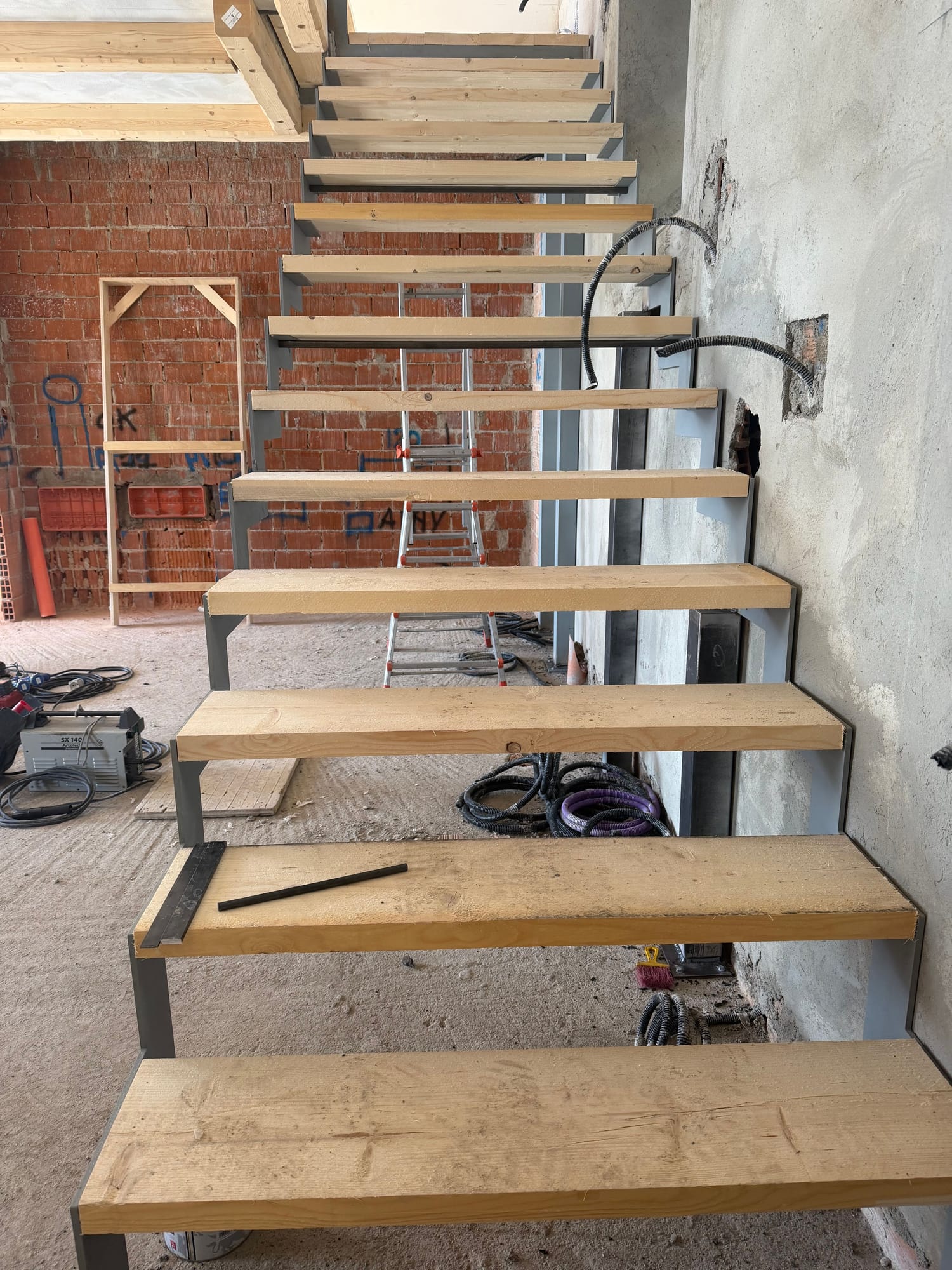 Oak treads on the steel stair