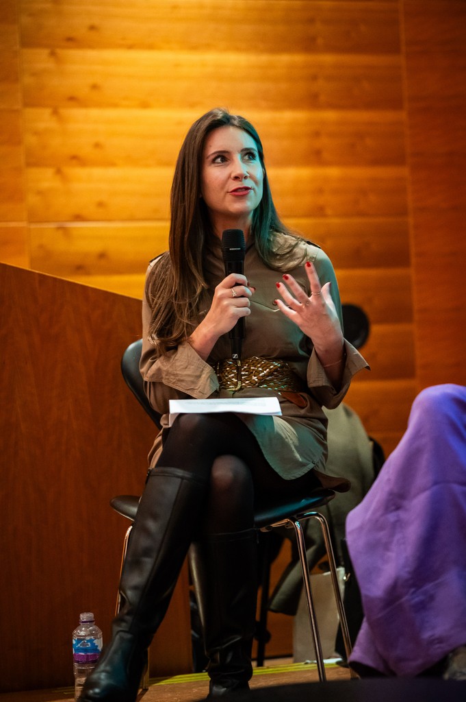 Founder Vanessa Defise speaking at opening party