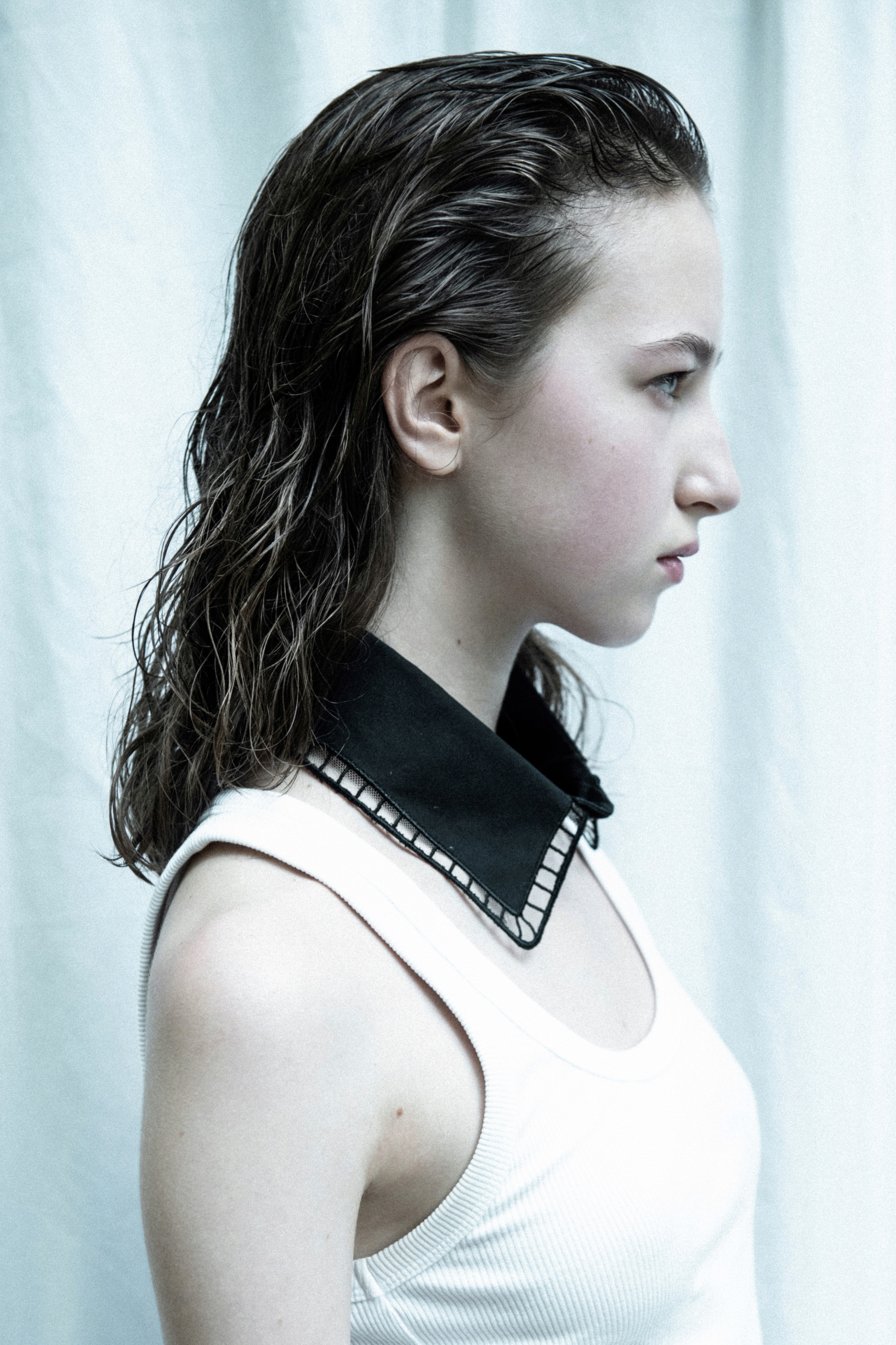 Man sitting on a skateboard