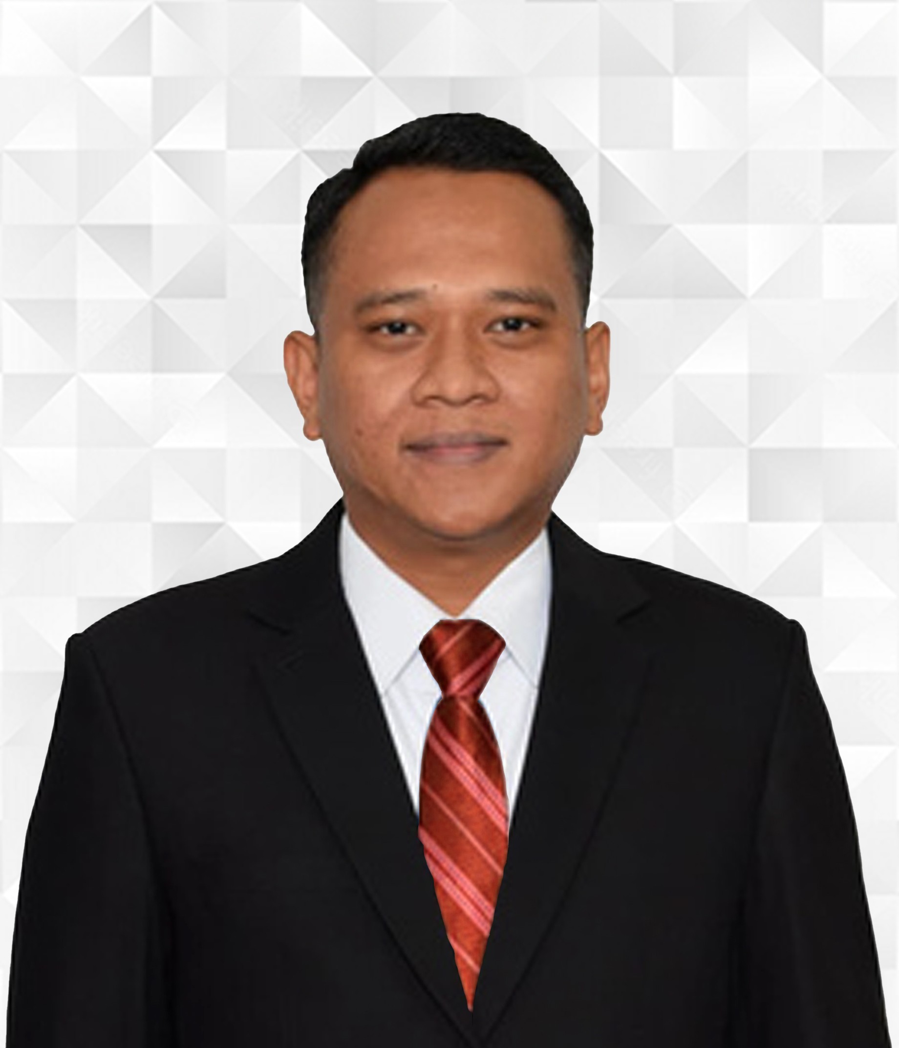 Foto portrait komisaris collega Ricad Saka menggunakan jas hitam dan dasi biru