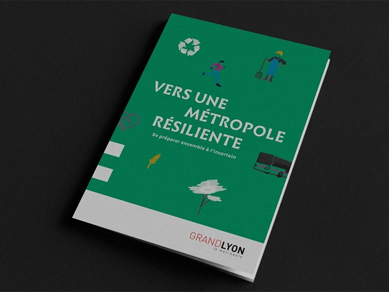 Brochure du Grand Lyon intitulée "Vers une métropole résiliente" avec des illustrations sur l'écologie et le climat sur fond vert.