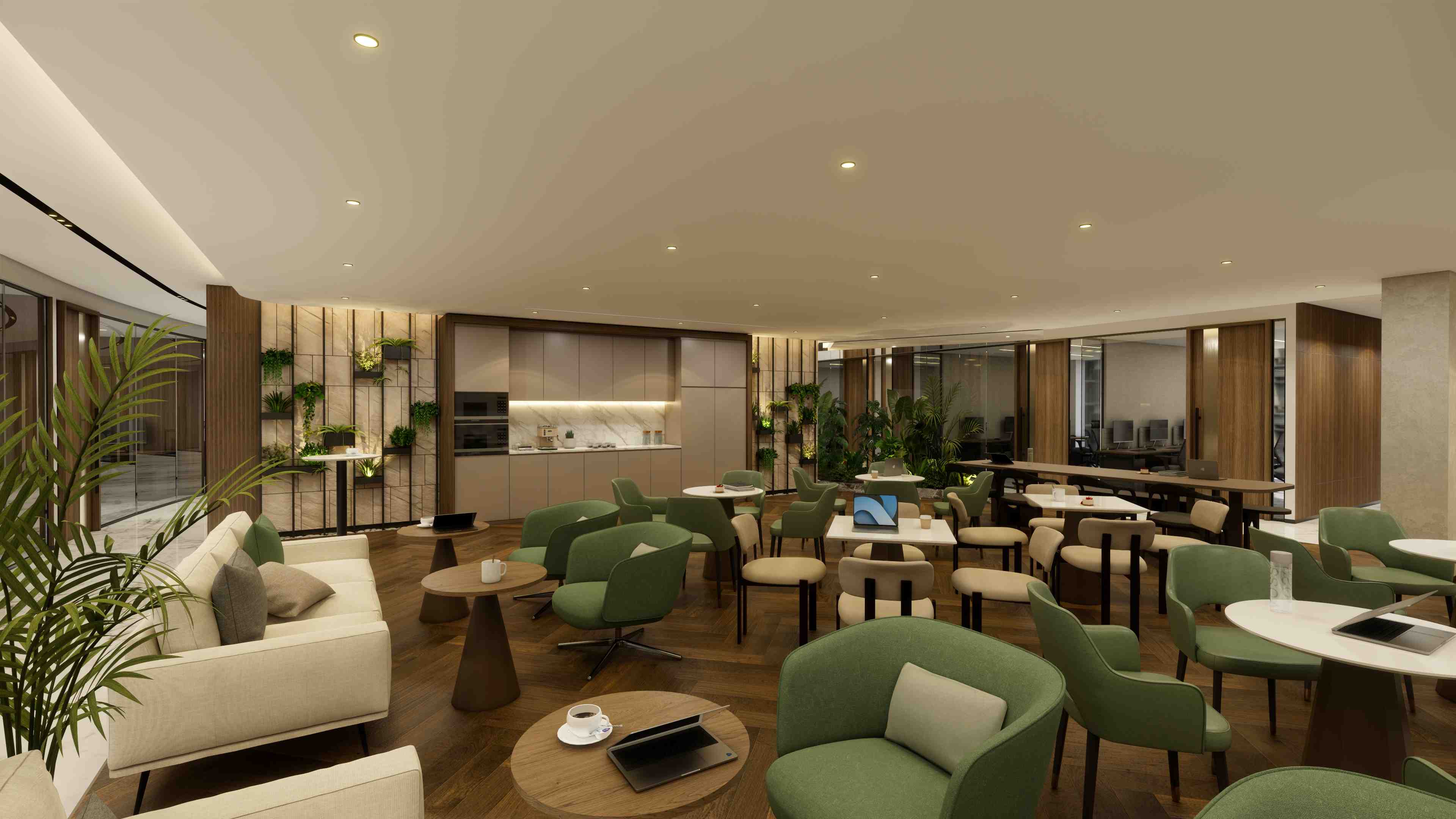 Shared lounge and pantry area with green seating, open coffee station, and a blend of social and workspaces.