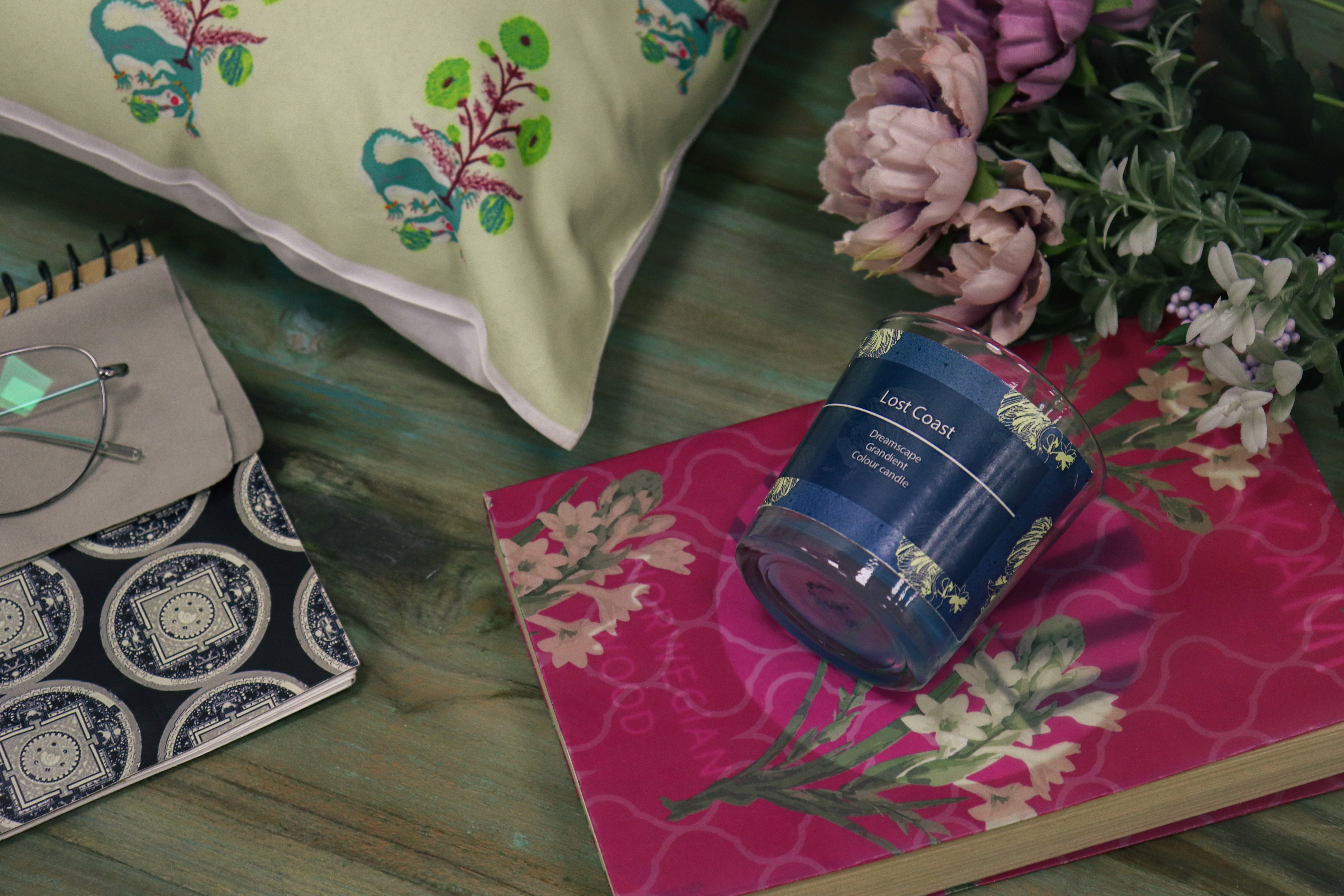 Laptop displaying website on wooden table