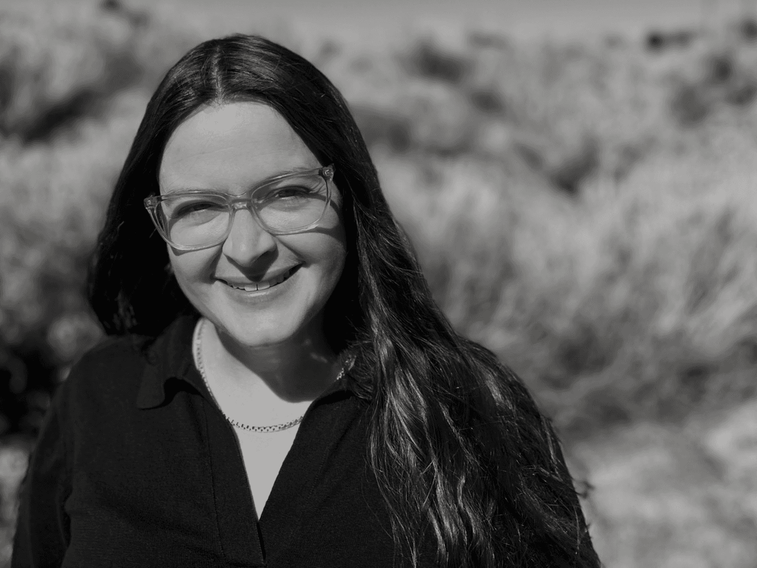 Person pouring Chemical in flask