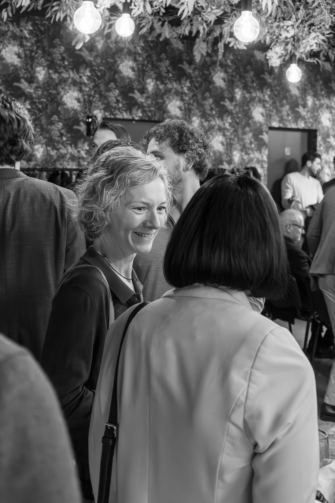Guests networking during the evening reception at a Crypto Valley event.