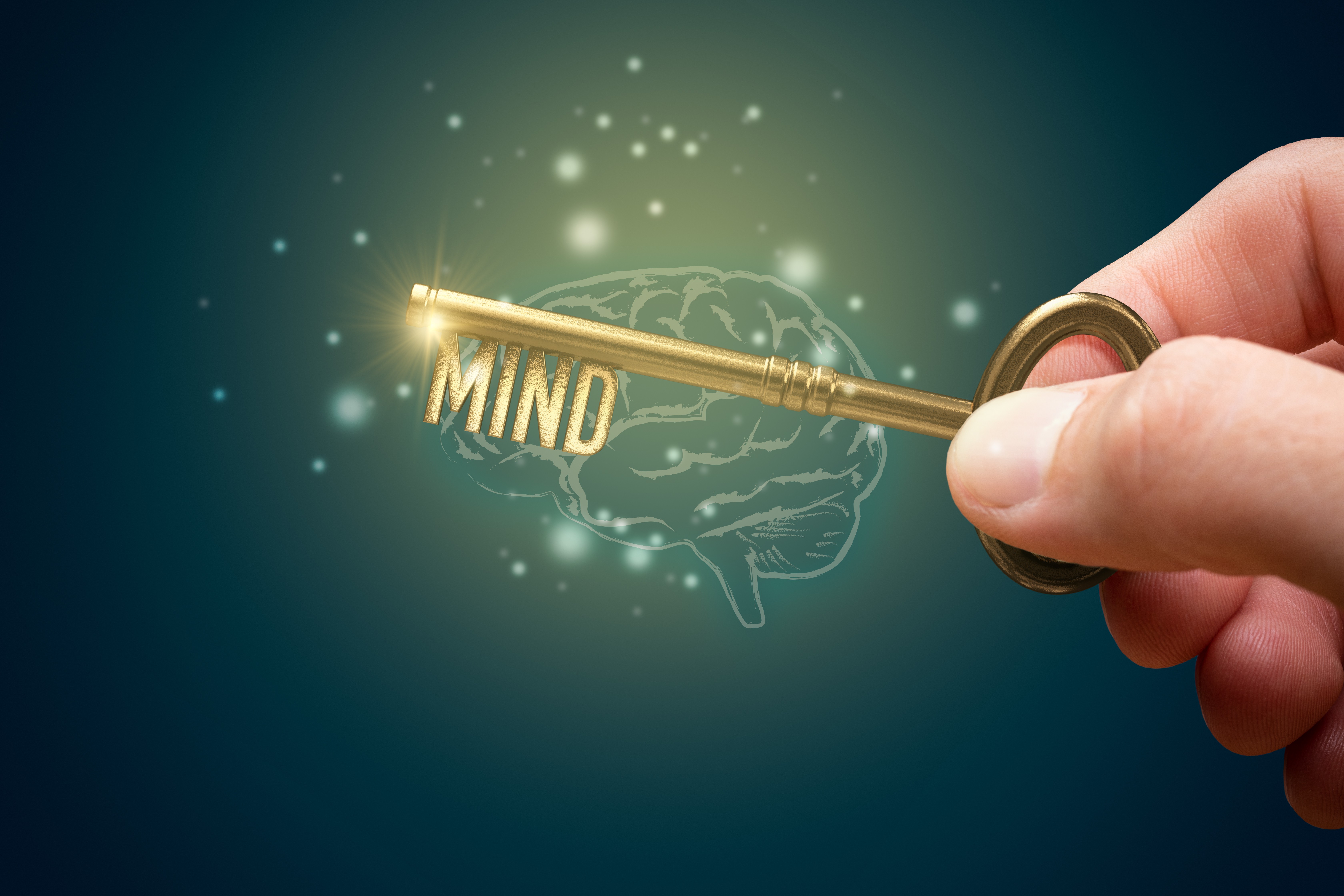 Hand, die Schlüssel hält mit Aufschrift MIND