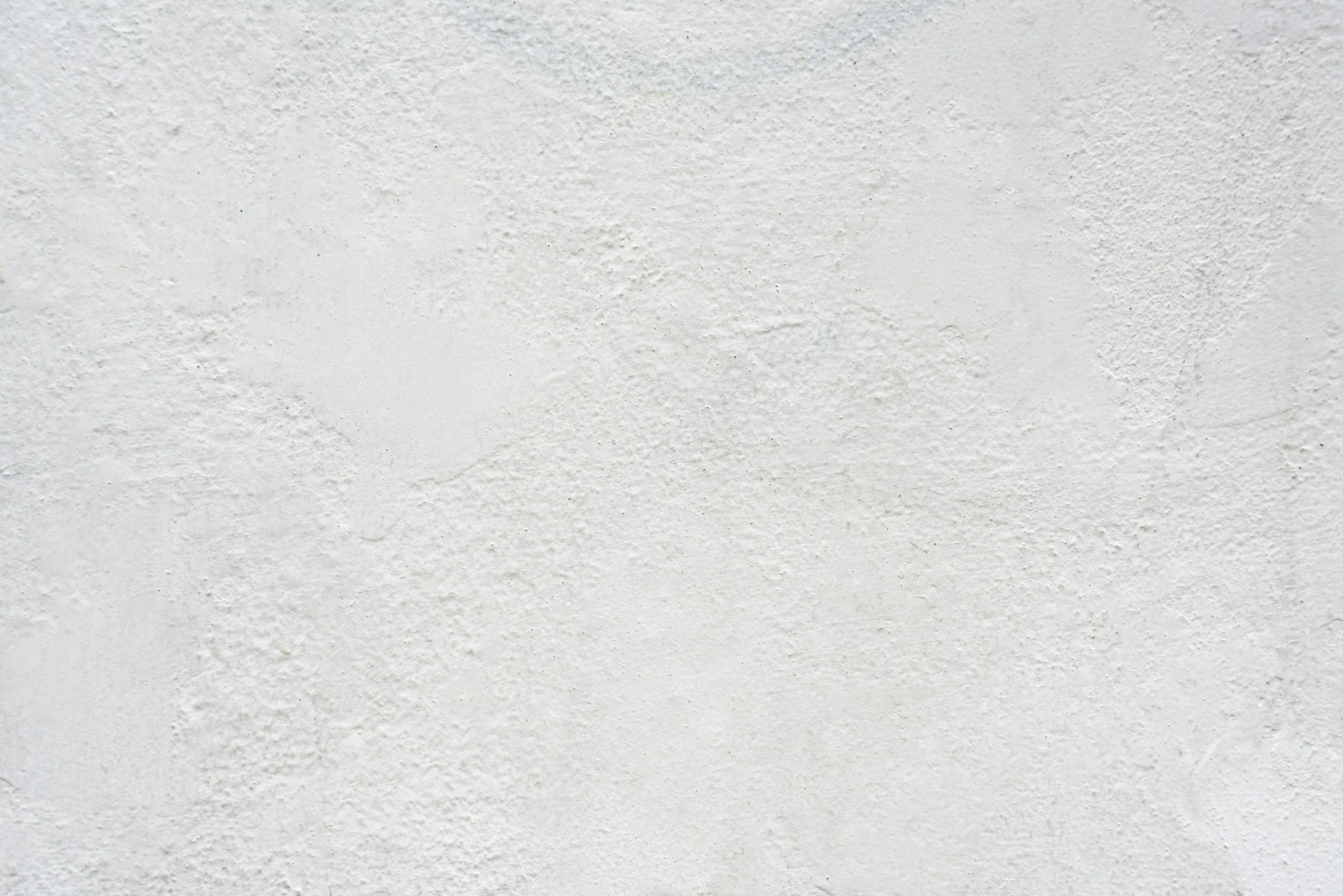 Raw clay wall texture used across the Marlova site