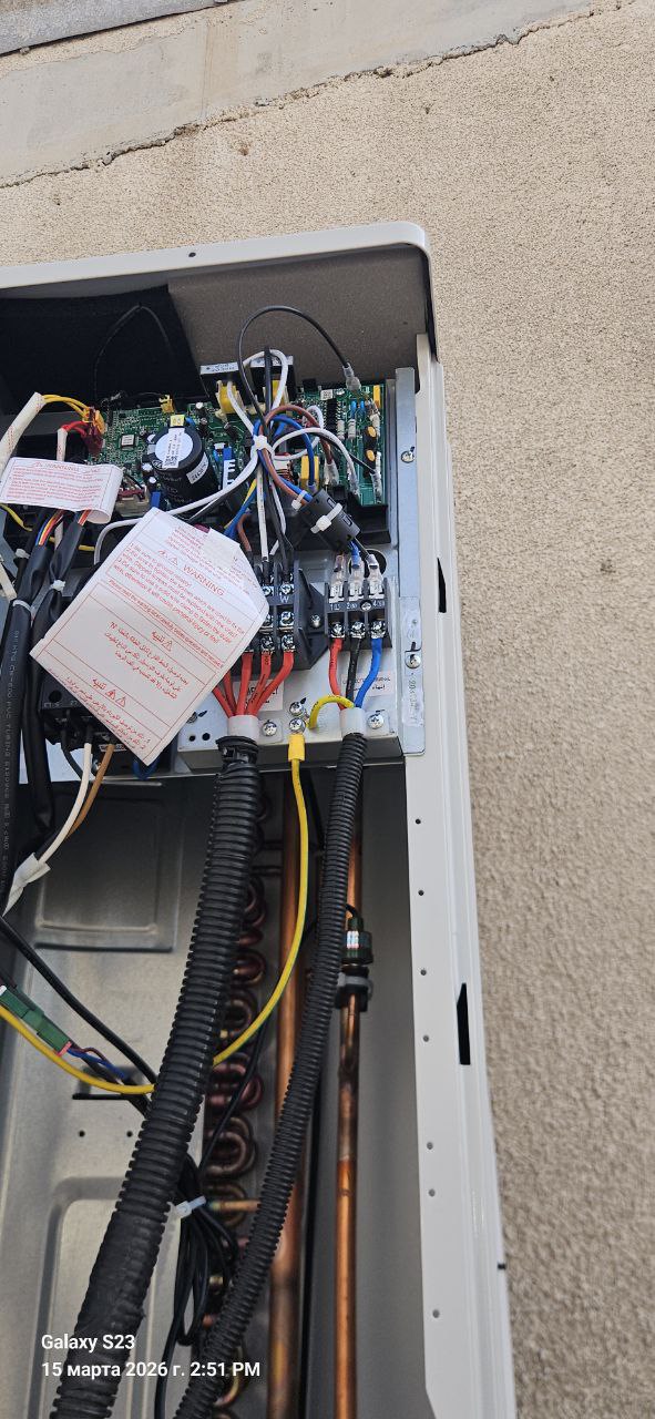 Outdoor HVAC unit opened for inspection at SpaceHUB.