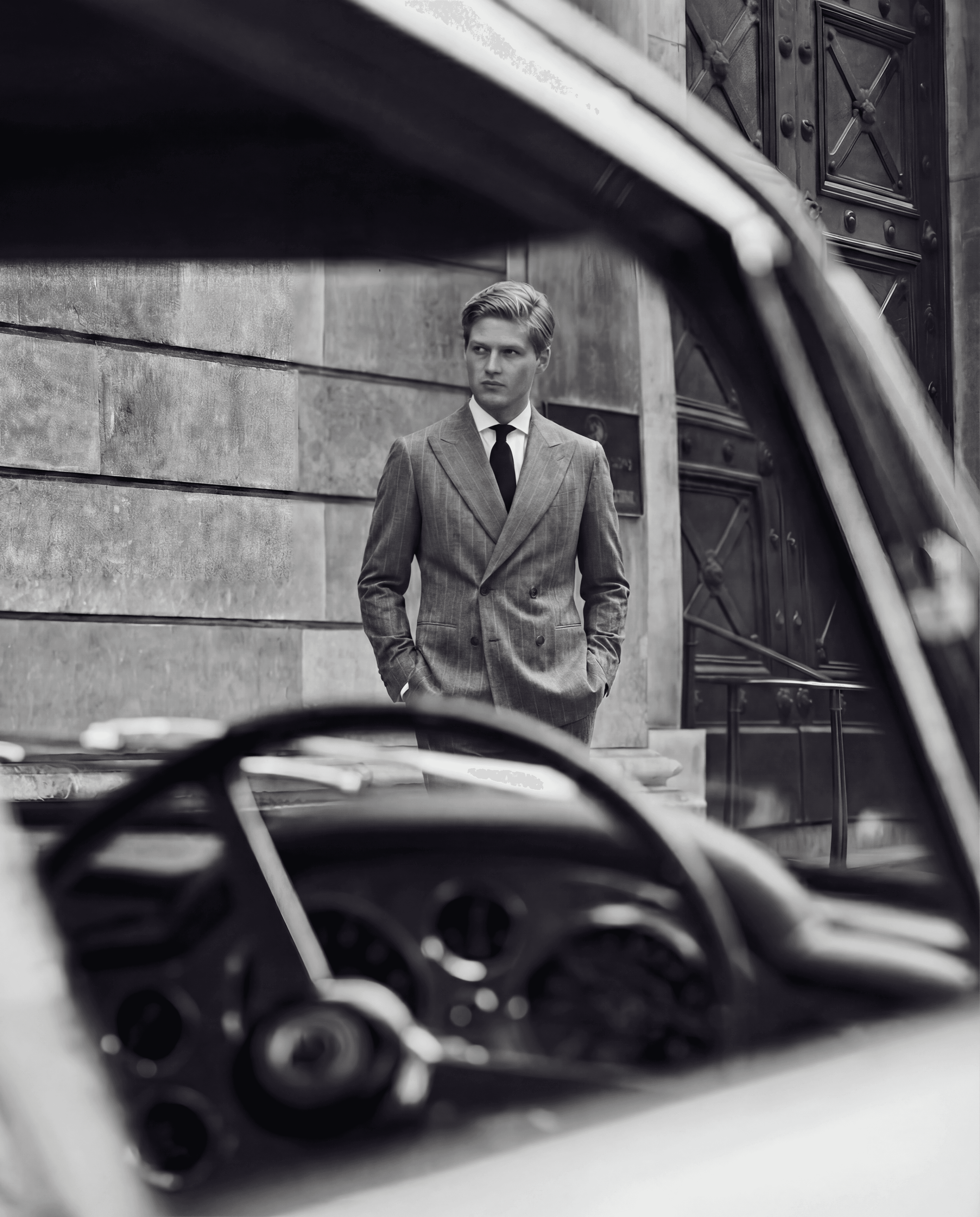 Ethereal light trails illuminate the night road, capturing the allure of speed and sophistication in the darkness.